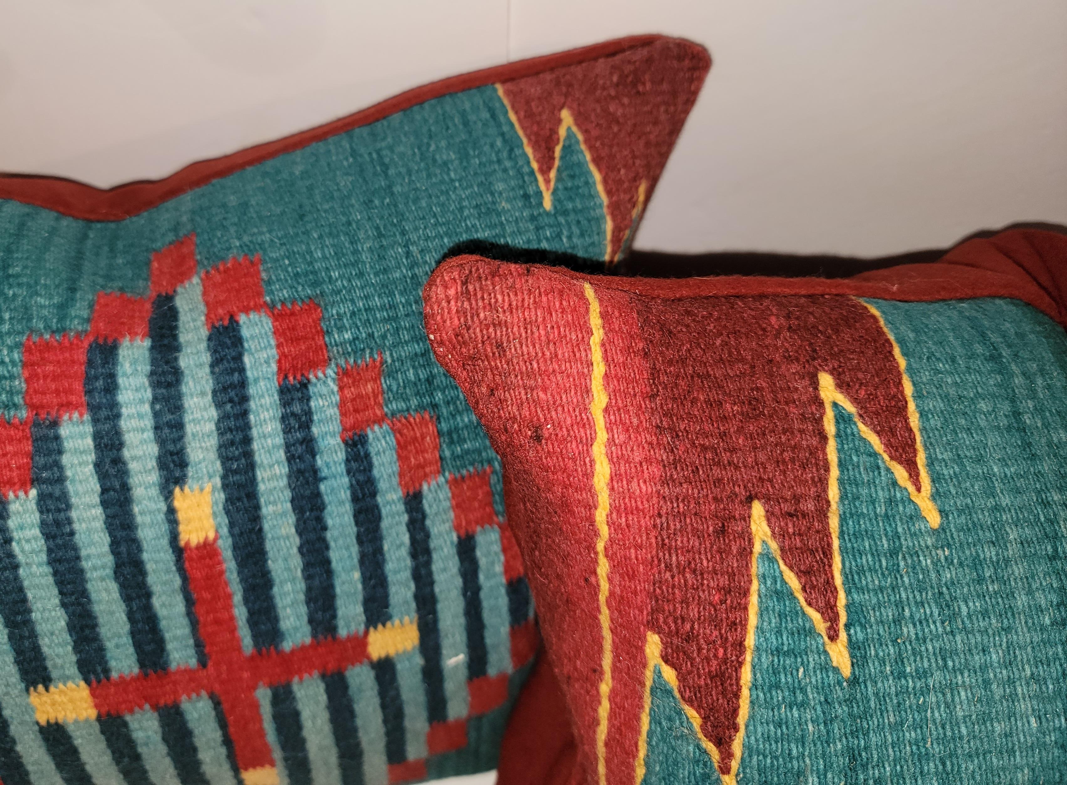 Pair of beautiful vintage Indian weaving textile custom made pillows. 
Feather and down inserts and zipped casing.