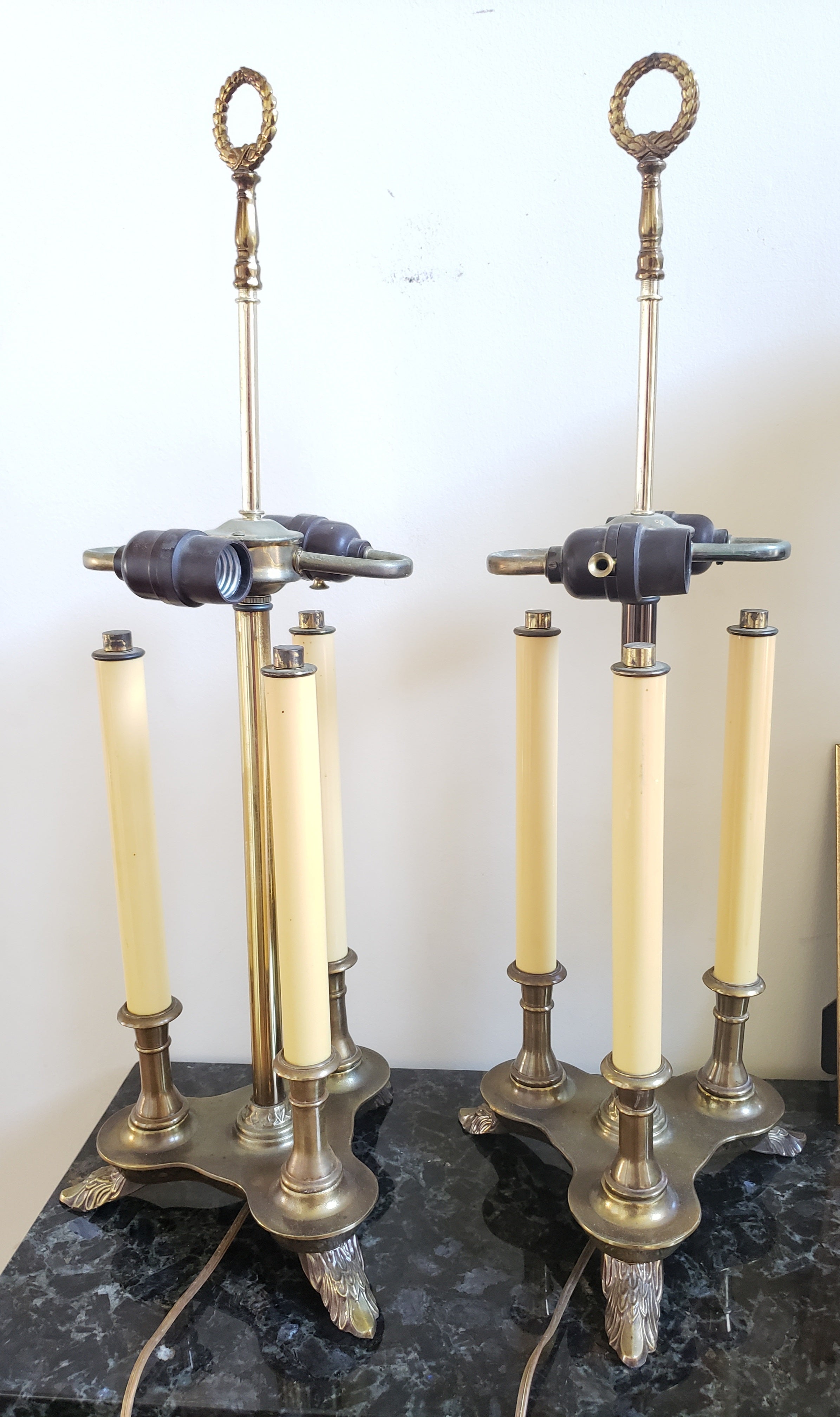Beautiful pair Beaux Arts Style Patinated Metal Two-Light Bouillotte table Lamps. 
Very good vintage condition. Measure 9 inches in width x 9 inches in depth at the base and stand 25.25 inches tall at the top of the finial. Lamp shades are optional.