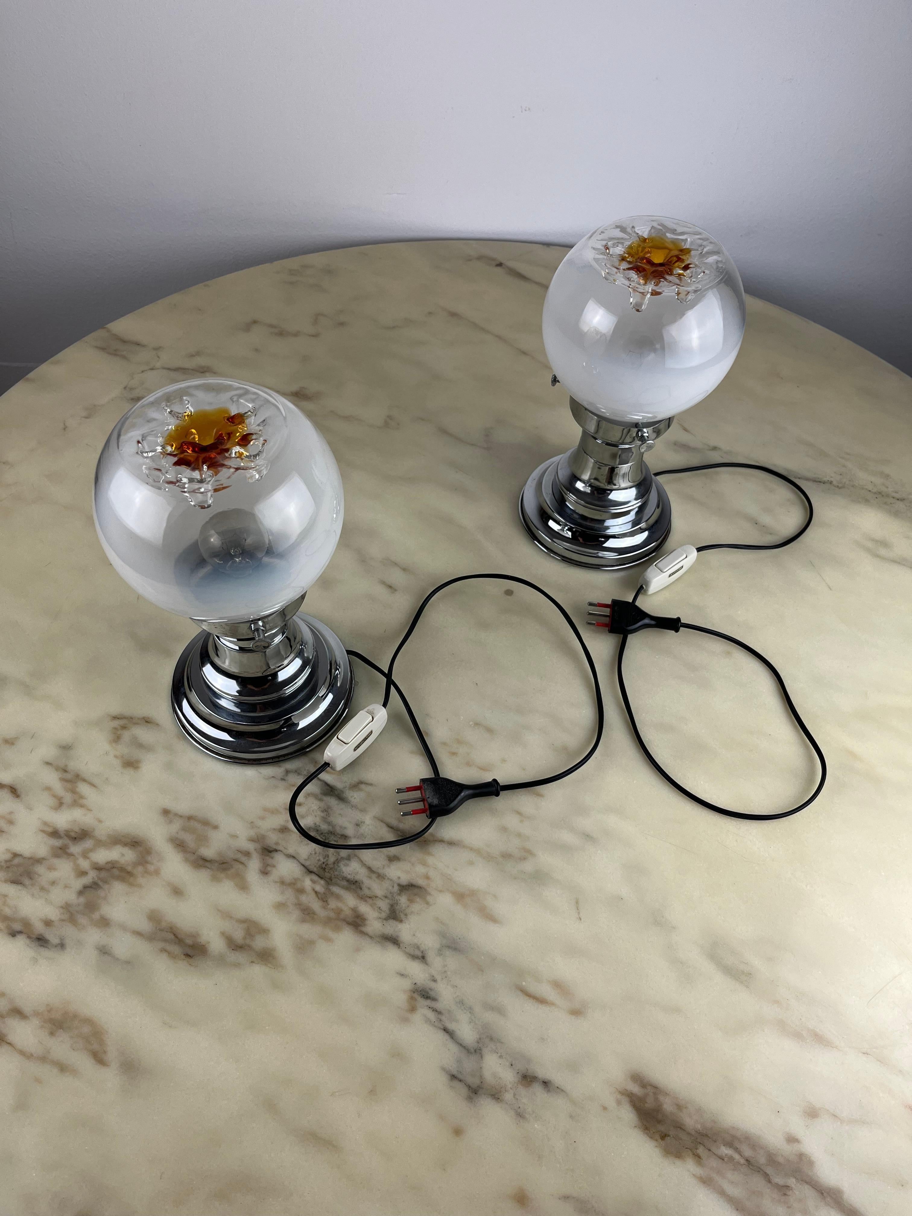 Pair of bedside lamps by Toni Zuccheri for Mazzega, Italy, 1970s.
Belonged to my grandparents and purchased in Venice.
Working and intact glass.
Small signs of time and use.


We guarantee adequate packaging and will ship via DHL, insuring the