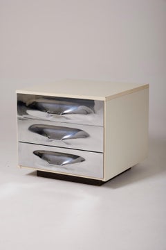 Pair of bedside tables by Raymond Loewy