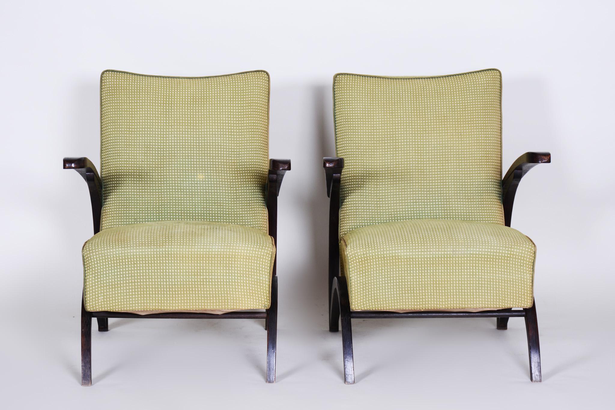 Pair of Art Deco armchairs.
United Arts & Crafts manufacture. Designed by Jindrich Halabala.
Original pollish, upholstery and fabric
Very well preserved.