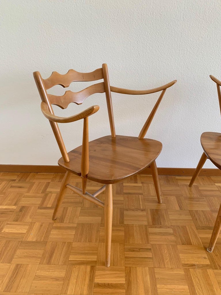 Elegant Pair of Elm and Beech Easy Chairs by Ercol, UK, 1950s. Model