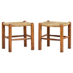 Coppia di sgabelli Tabouret in stile Charlotte Perriand con sedile in Beeche e giunco c1970 Francia