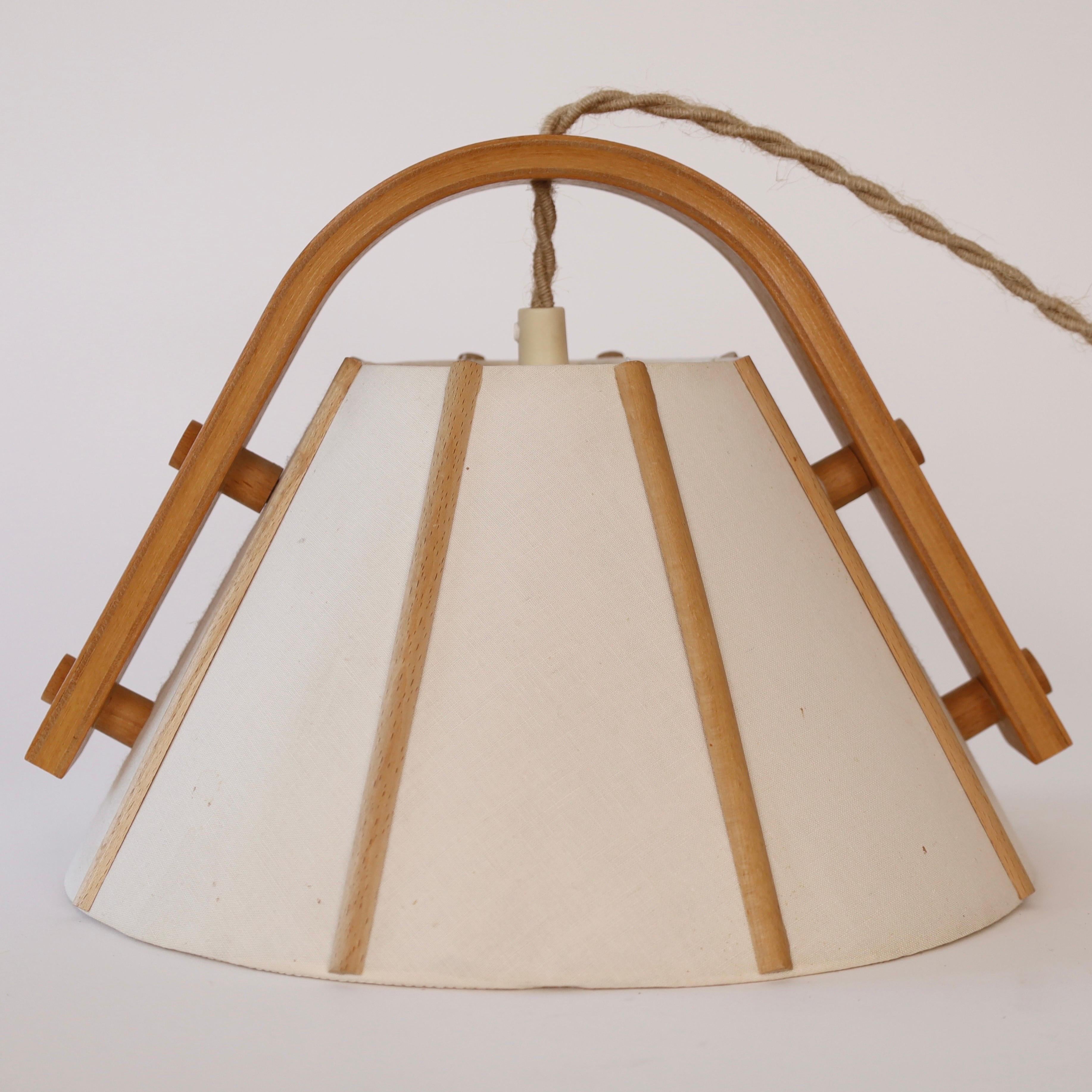 Pair of Beech wood pendant lights by Jan Wickelgren, 1970s, Sweden 4