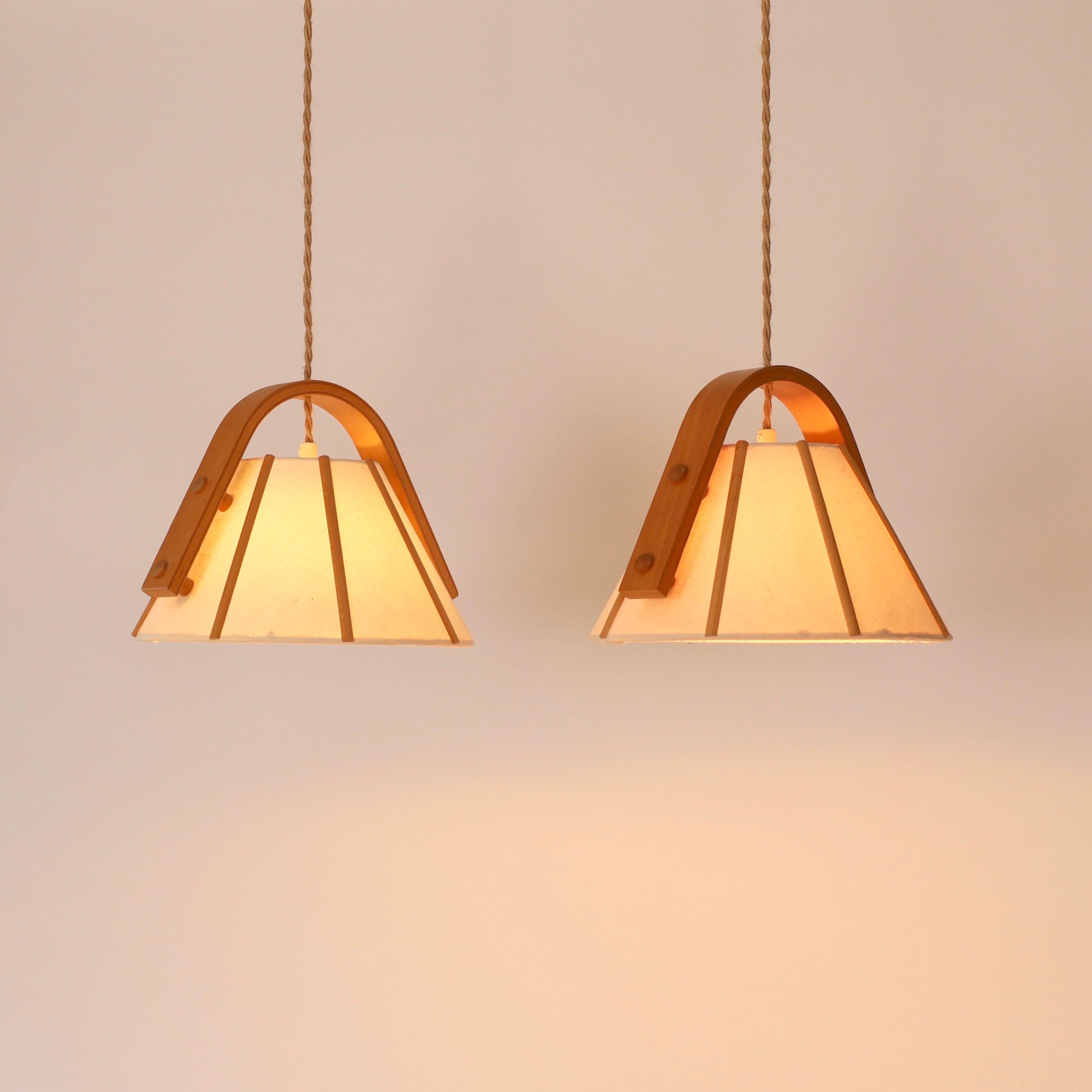 Danish Pair of Beech wood pendant lights by Jan Wickelgren, 1970s, Sweden