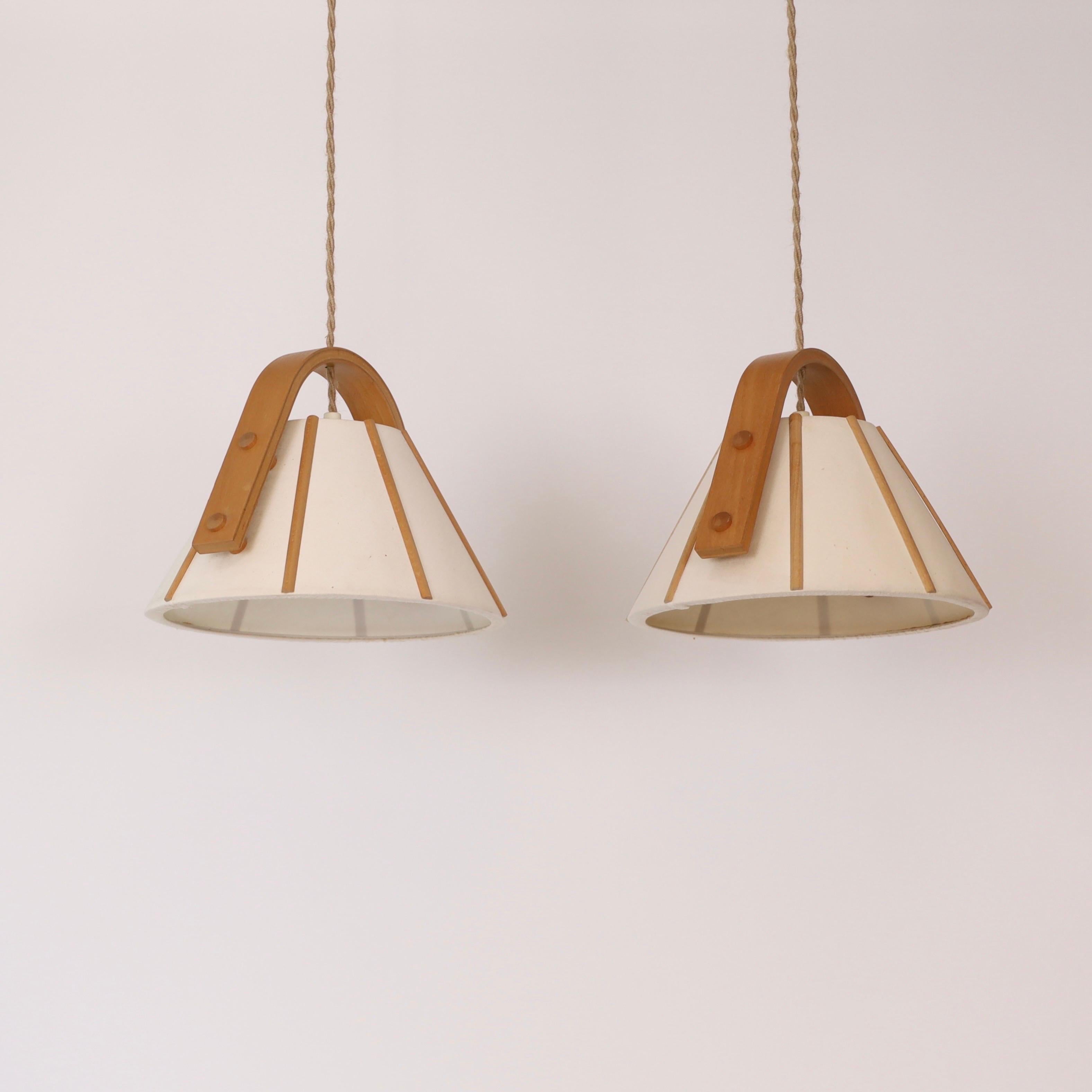 Fabric Pair of Beech wood pendant lights by Jan Wickelgren, 1970s, Sweden