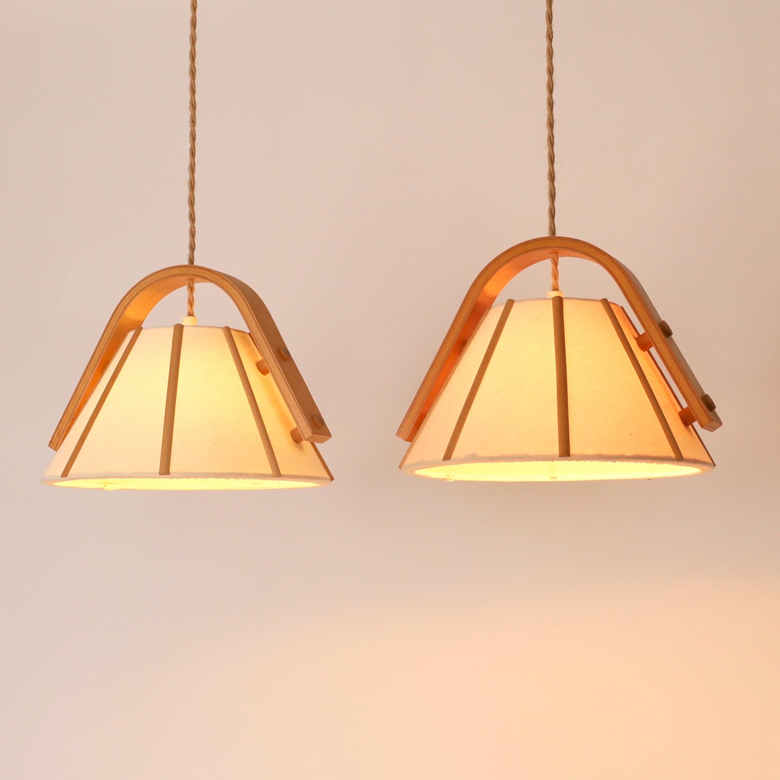 Pair of Beech wood pendant lights by Jan Wickelgren, 1970s, Sweden 1