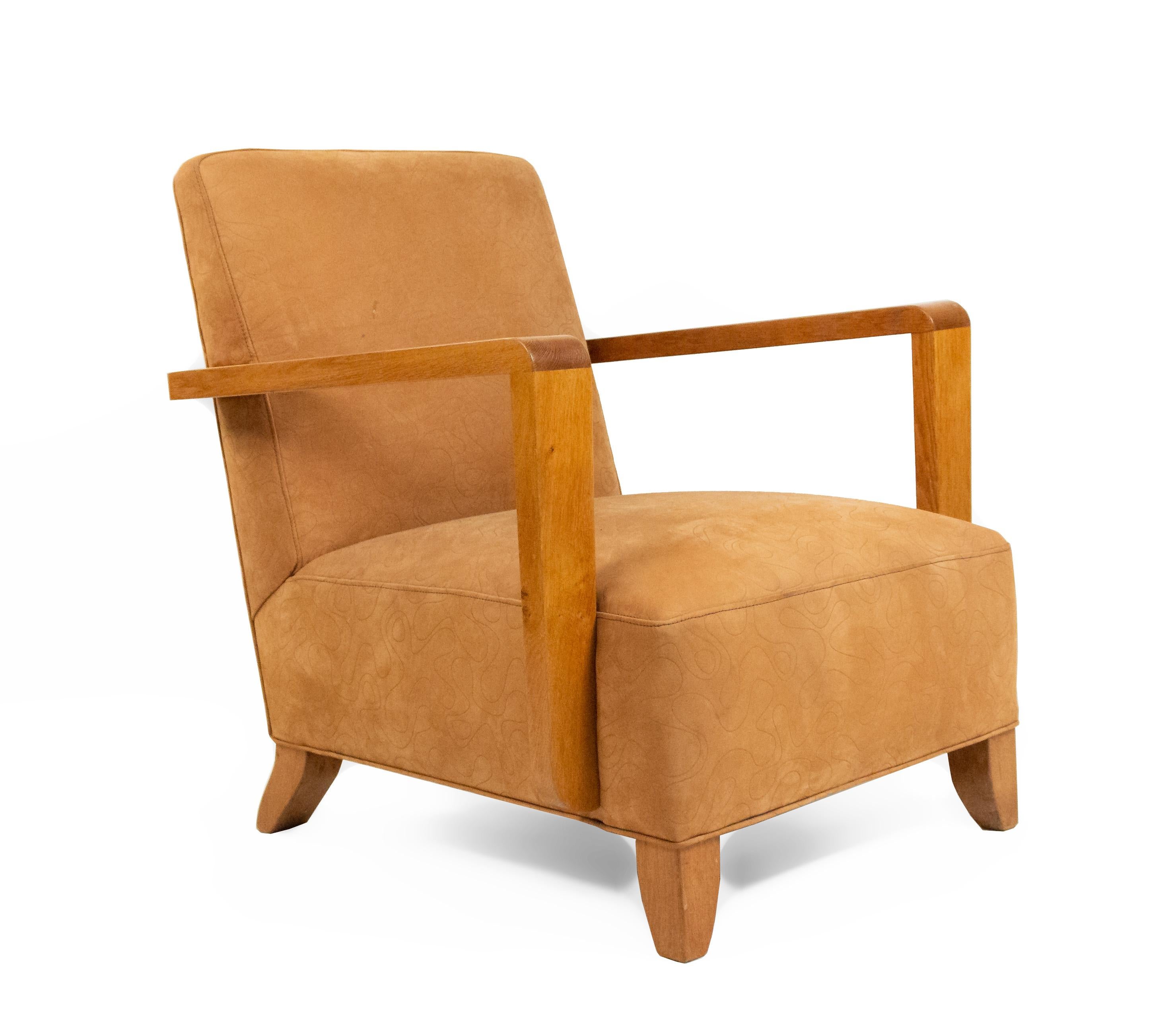 Pair of French Modernist geometric form (1940s) oak open arm chairs with a seat & back upholstered in tan suede with an impressed squiggle pattern.