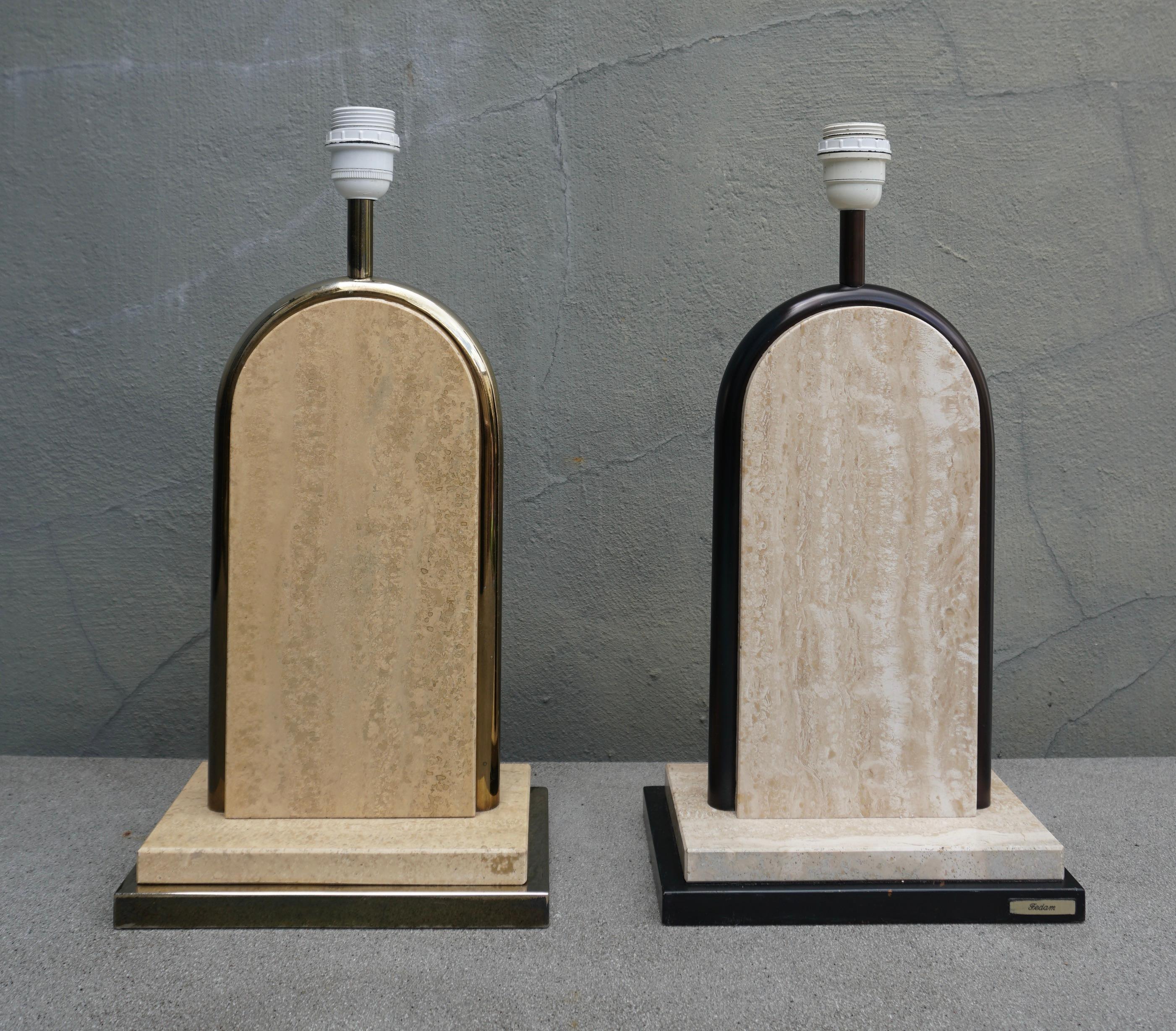 Pair of minimalist beige travertine and gilt metal table lamps. 
In the style of Romeo Rega.