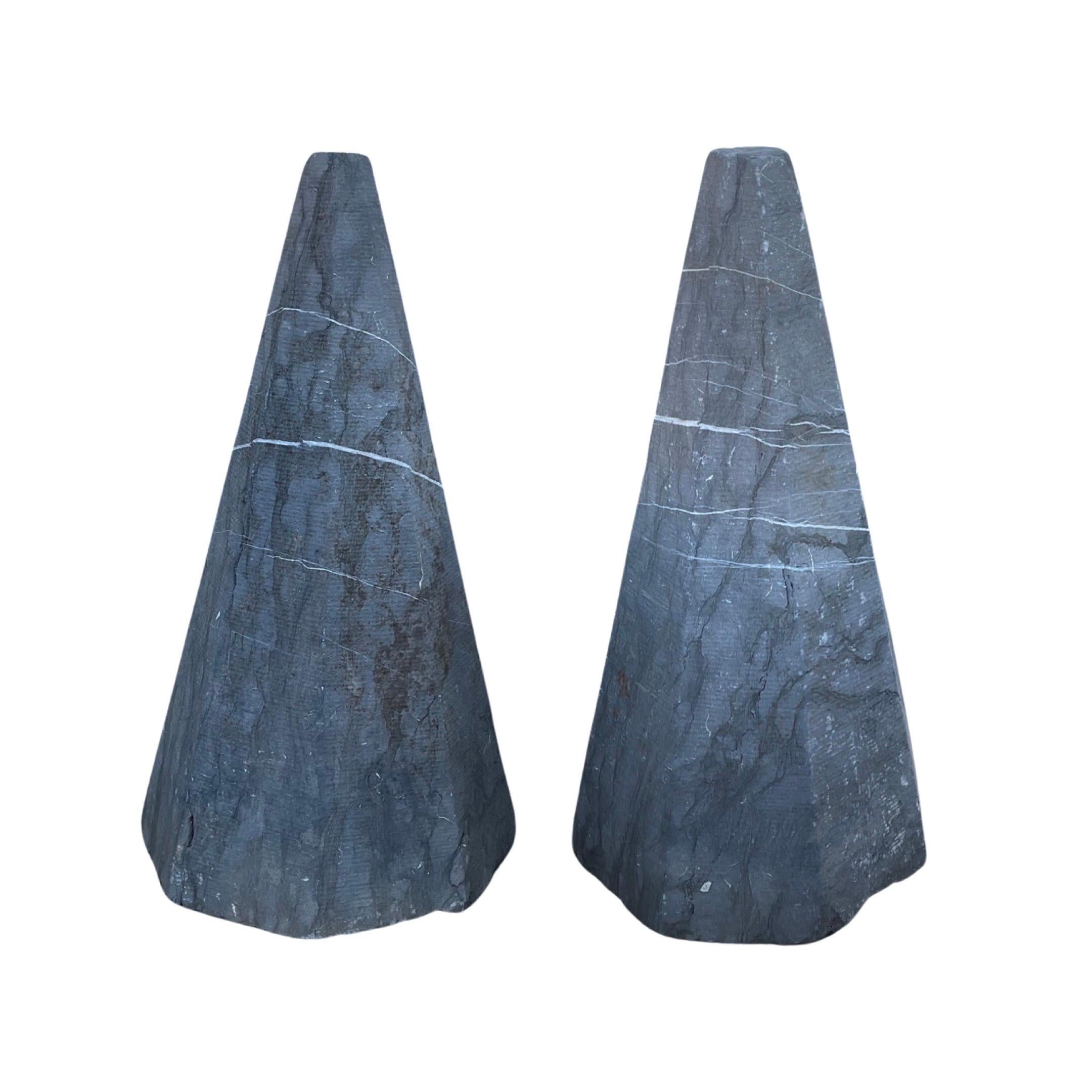 These 18th-century cone sculptures are made from premium Belgium bluestone and are ideal for enhancing any indoor or outdoor design project. Their unique shape provides a striking visual element to add an element of elegance to any space. 