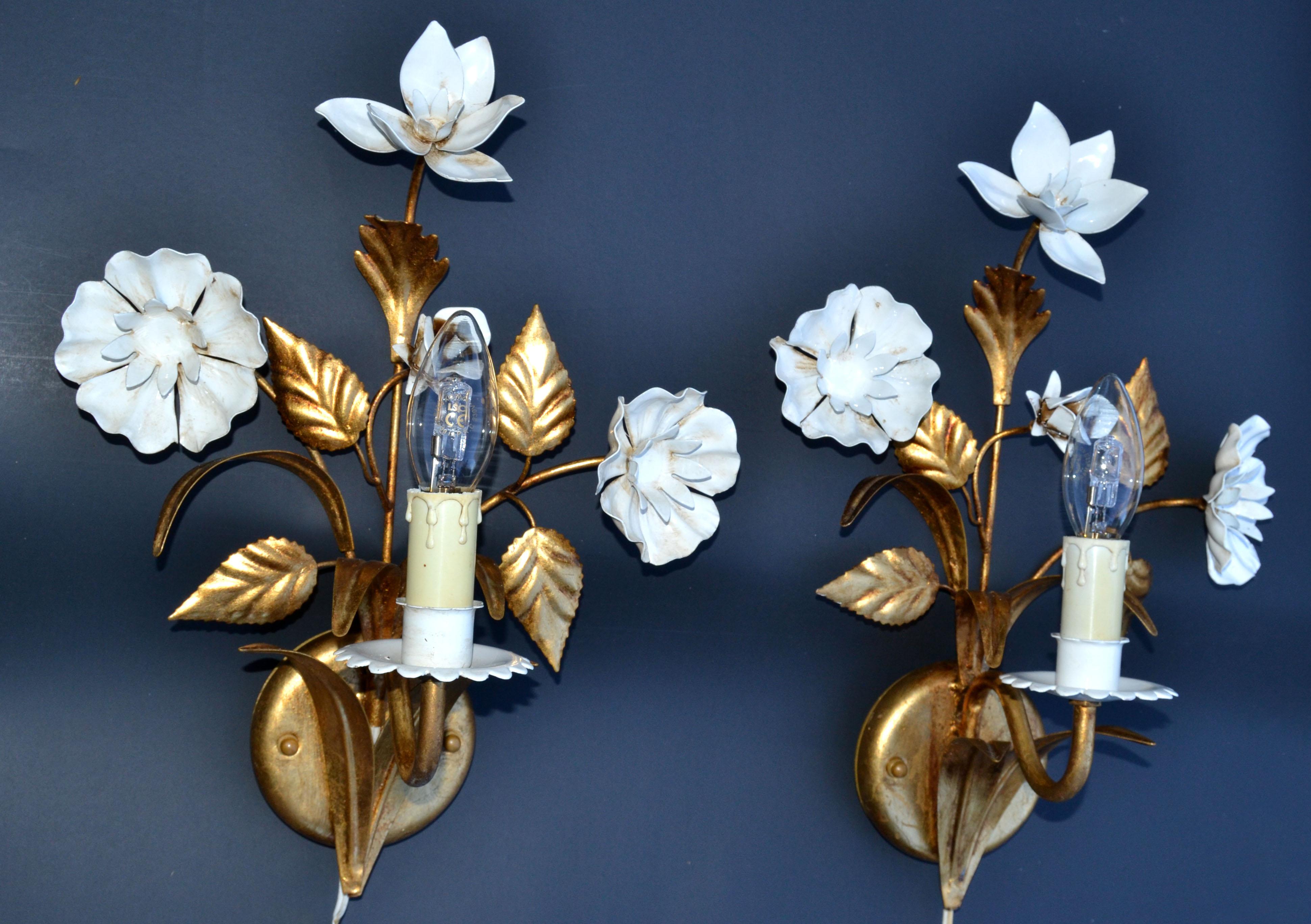 Superb pair of 1 light Belgium brass and enamel flower sconces in gold white finish.
Each take one E14 Candelabra light bulbs with max. 60 watts.
Round Back Plate measures: 4 inches diameter.

 