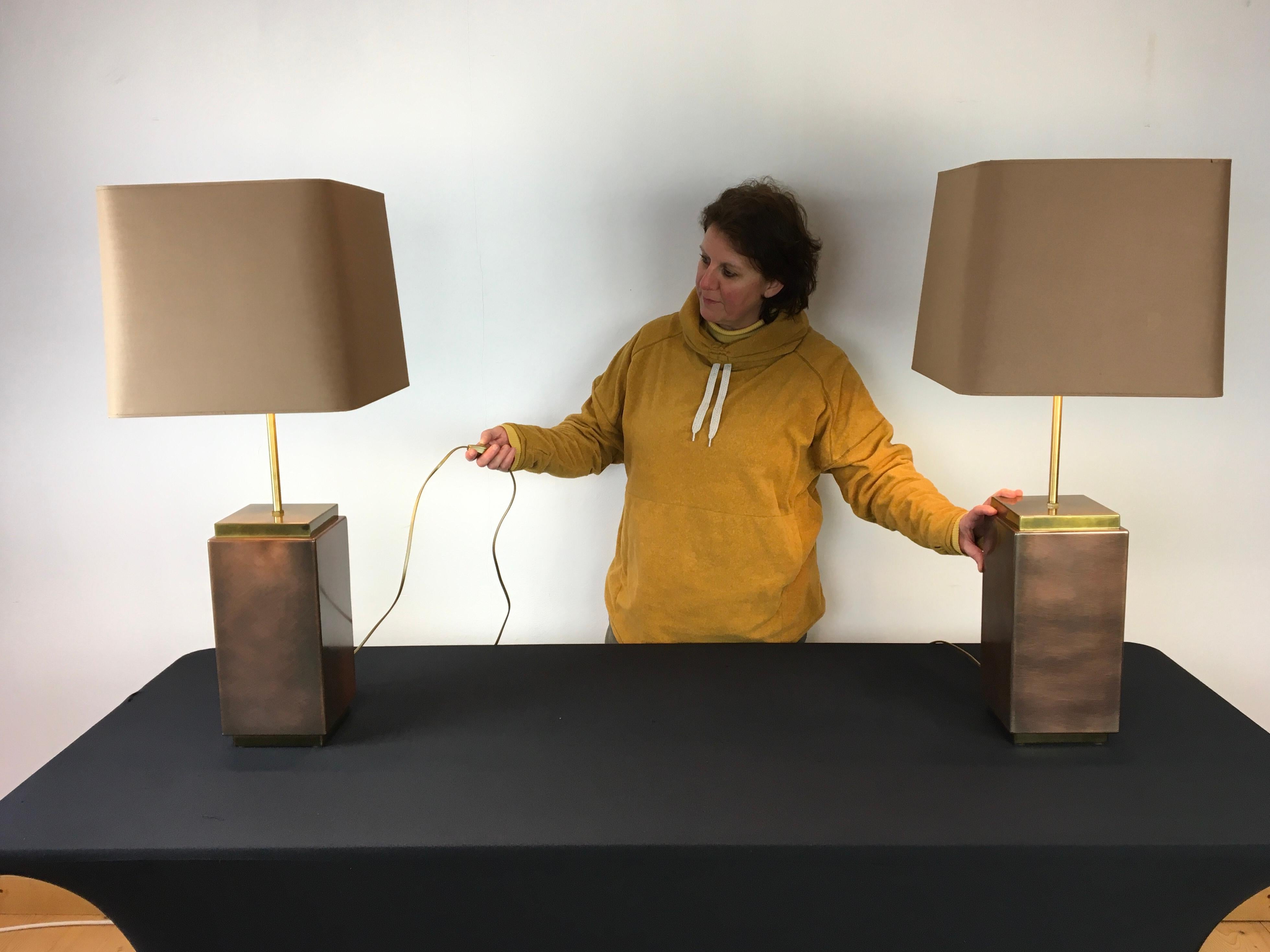 Pair of Belgo Chrome table lights. 
2 rectangular shaped table lamps made from copper and brass. 
Each table lamp has 2 light points for large fitting. 
The height of the table light base can be adjusted higher and lower depending on the size of