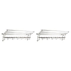 Pair of Belle Époque Coat Racks, Silver-Plated Metal.