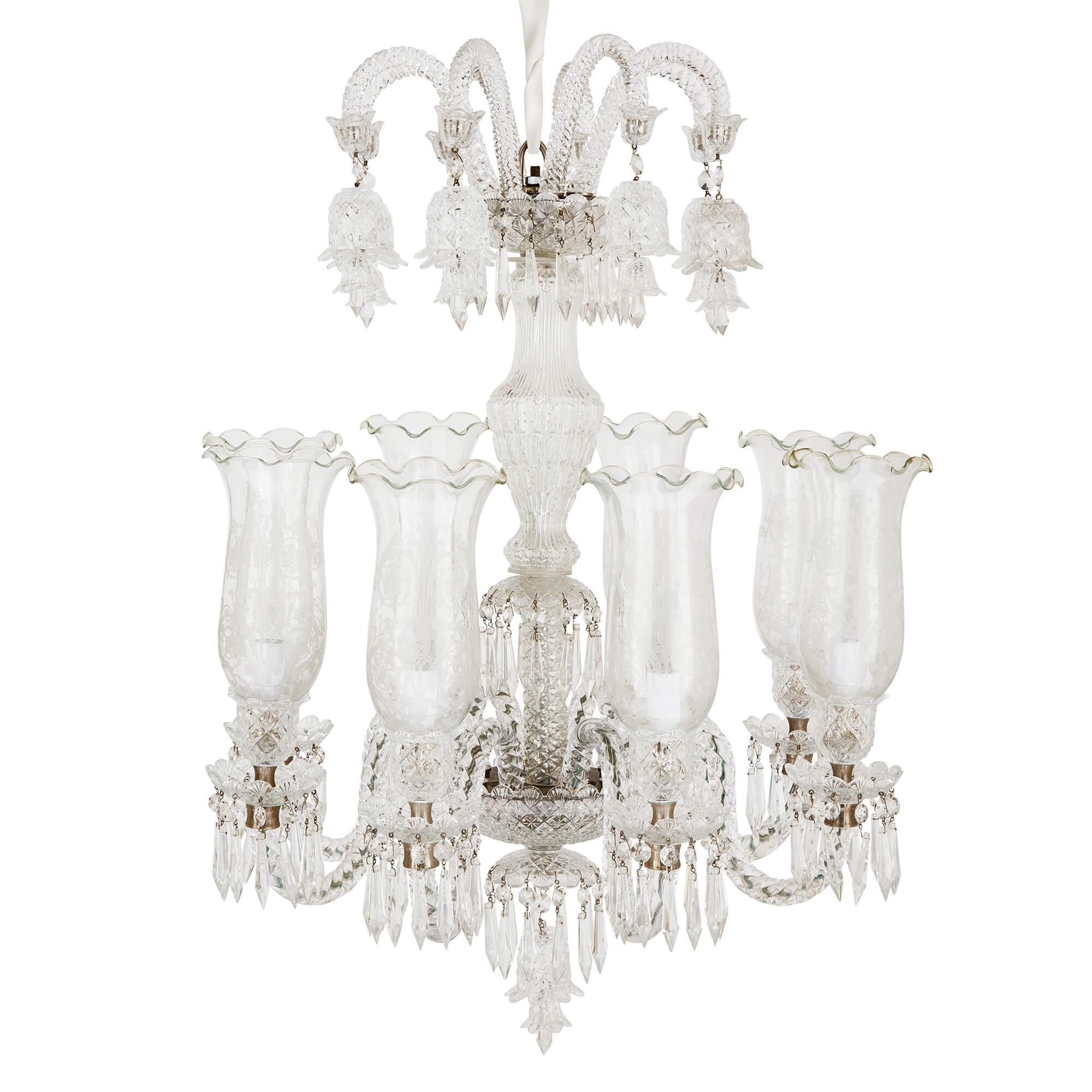 Pair of Belle Époque style clear cut-glass chandeliers
Continental, 20th Century
Height 91cm, diameter 65cm 

This magnificent pair of chandeliers is crafted in the lavish Belle Époque style, which characterised French design at the turn of the 20th