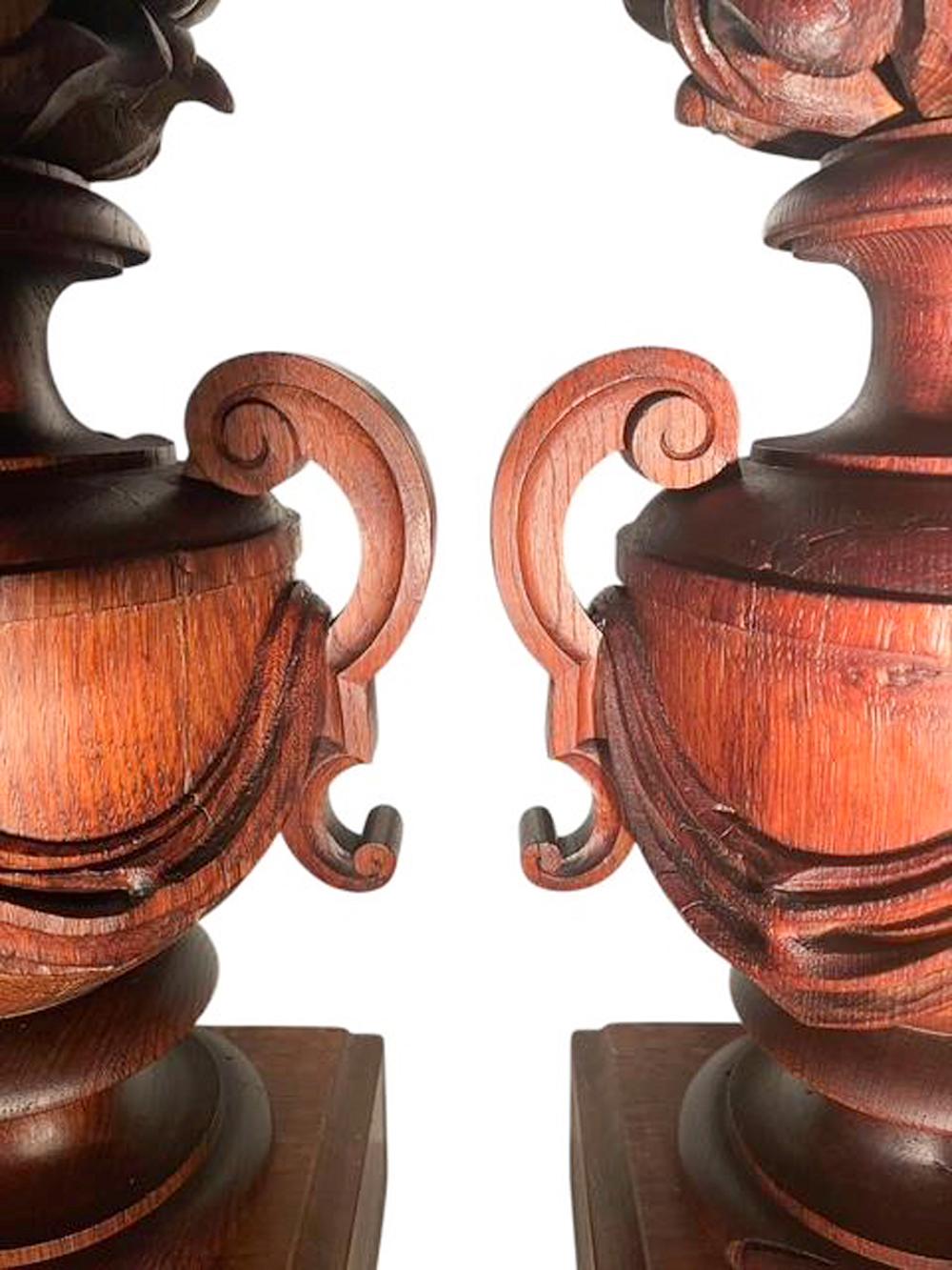 Oak Pair of Belle Epoque Swaged Urn-Form Architectural Elements with Flame Finials For Sale