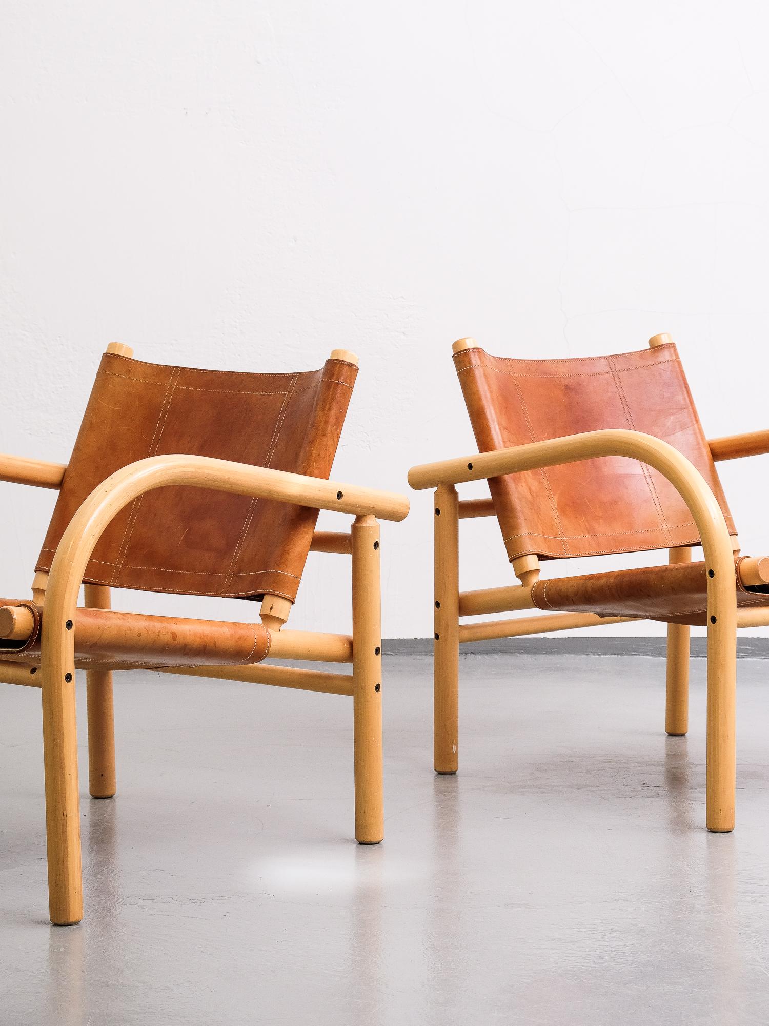 Classic safari chair designed in 1974 by Ben af Schultén for Artek. Birch frame with seat and back in natural leather. This is the bigger lounge chair model.