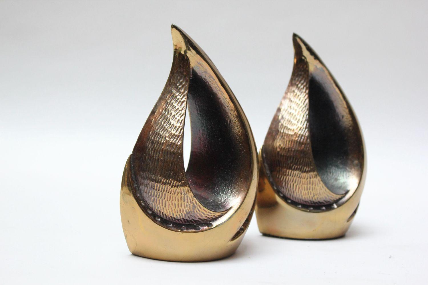 
 Pair of tear-drop form brass bookends Designed by Ben Seibel for Jenfredware as part of the 