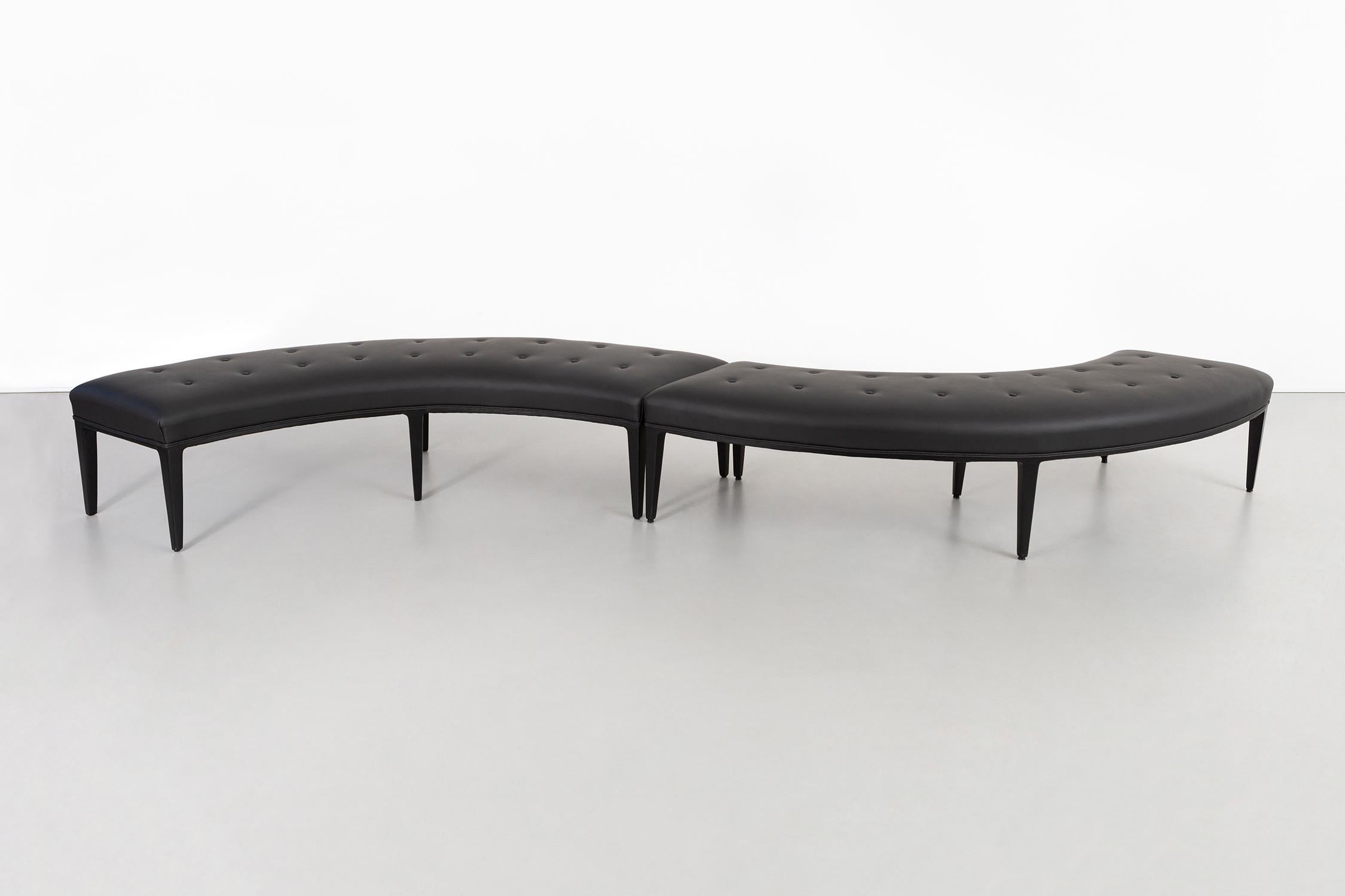 Pair of benches attributed to Harvey Probber

These curved benches have been freshly reupholstered in black leather

The shape allows various configurations

Measurements are per bench

Sold as a set