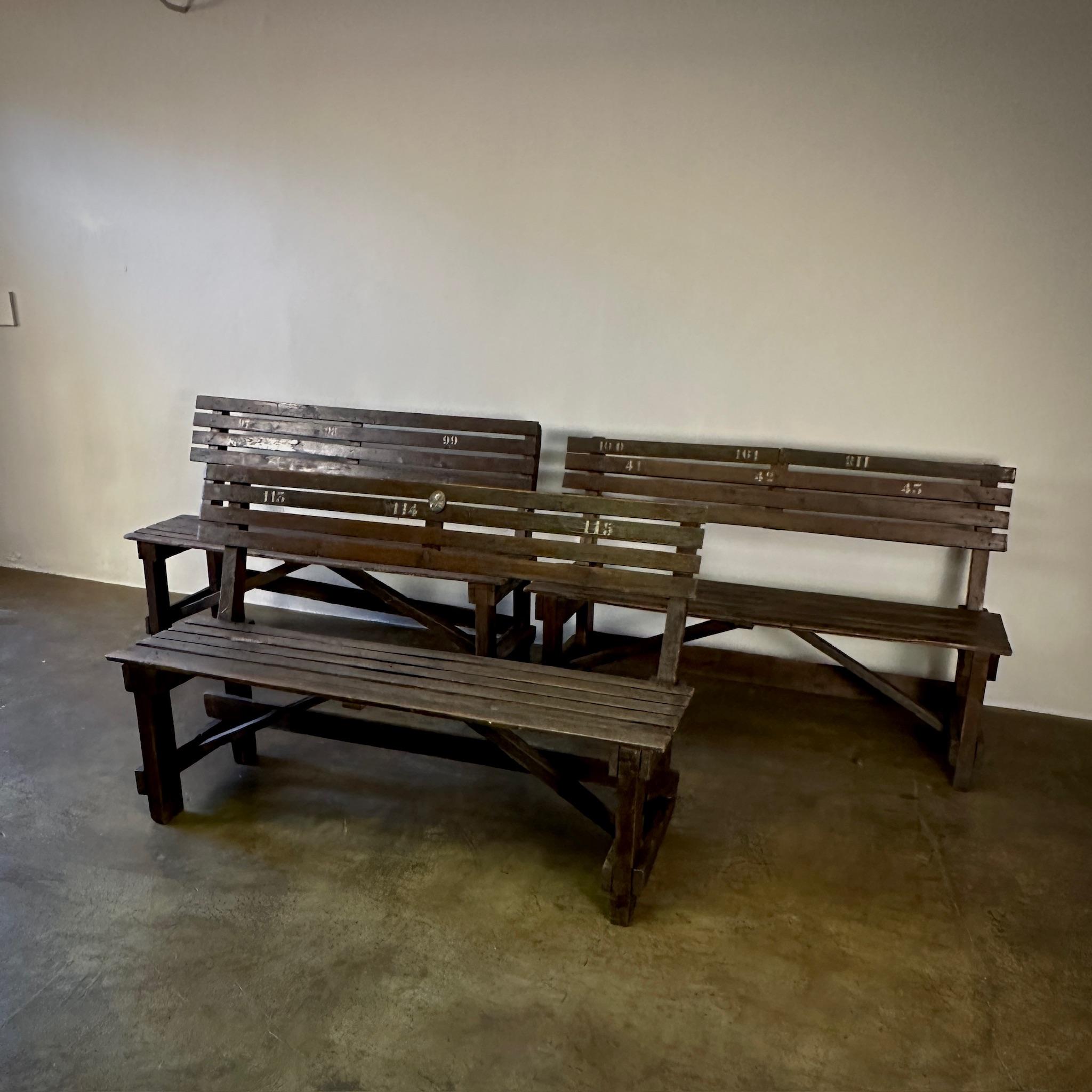 Three rustic wood benches, originally built for a boys school in late 19th century France. With their handsome scholastic feel and simple silhouette, these would work well in a variety of spaces. Can be sold individually.

France, circa