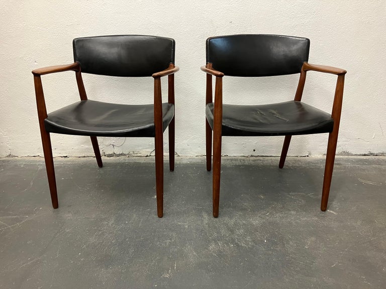 Handsome teak and leather armchairs from the studio of master cabinet maker Willy Beck. Great patina and original leather. Metal labels to underside.