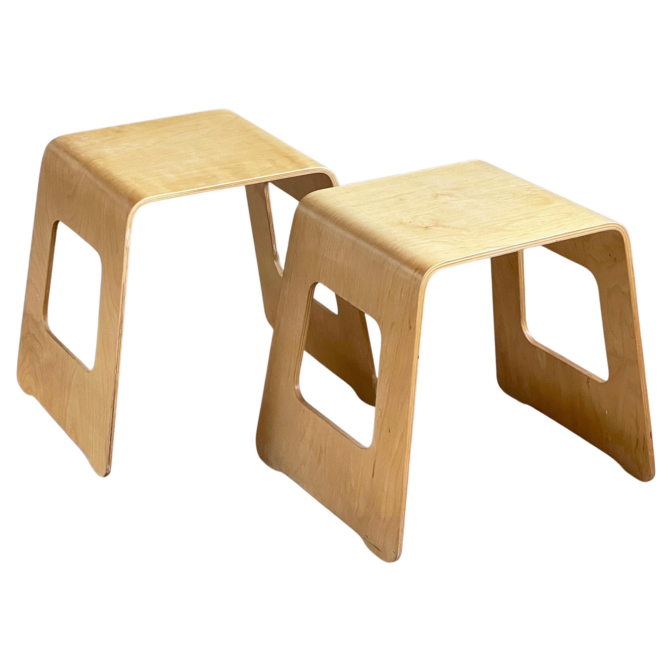 Pair of IKEA Benjamin plywood stools designed by Lisa Noringer, 1990's. Made of plywood. Stackable and can be used either as a stool or side table. Modern iconic designs from Ikea. 
In very good condition with light signs of wear consistent with age