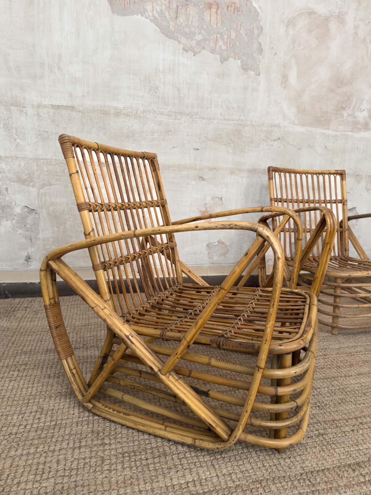 Pair of Paul Frankl bent bamboo armchairs, 1940s 
Product Details 
Featuring a squared backrest and wide armrests. 
Dimensions: 65 W x 81 H x 69 D cm