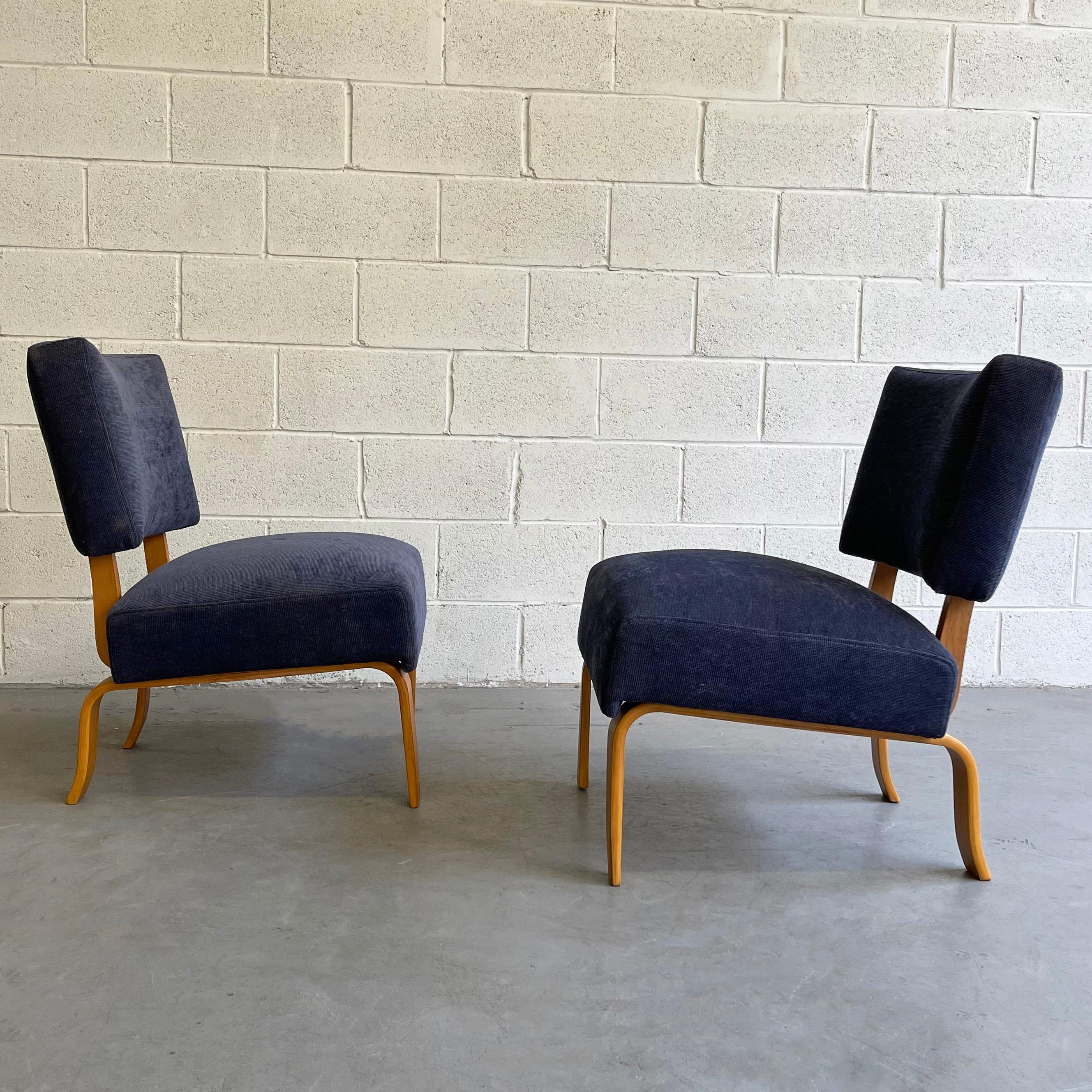 Pair of slipper lounge chairs by Thonet feature natural bent maple frames with deep blue corduroy upholstered seats and backs.