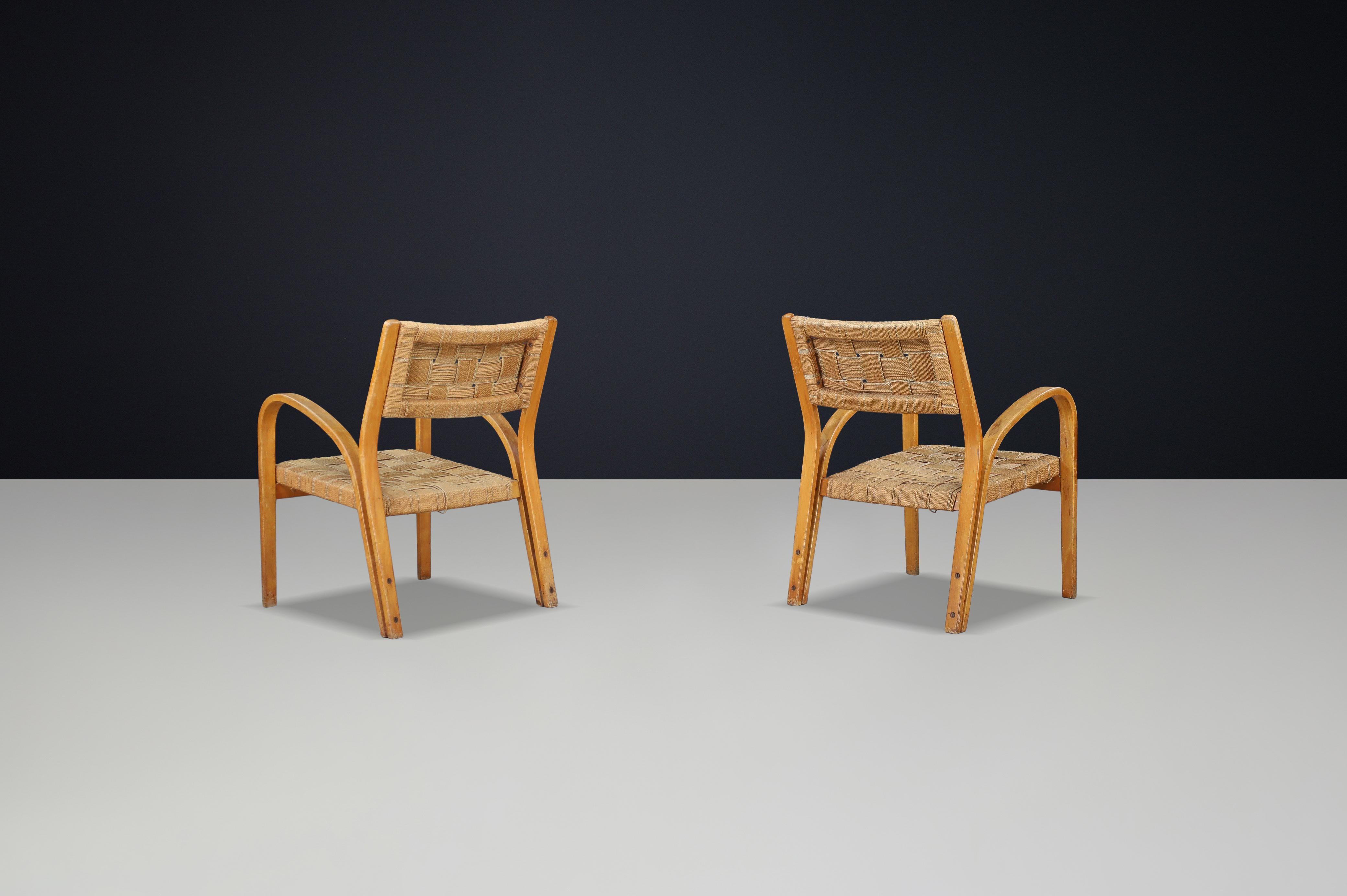 Coppia di poltrone in compensato curvato e corda intrecciata di Augusto Romano, Italia, anni '40 In condizioni buone a Almelo, NL