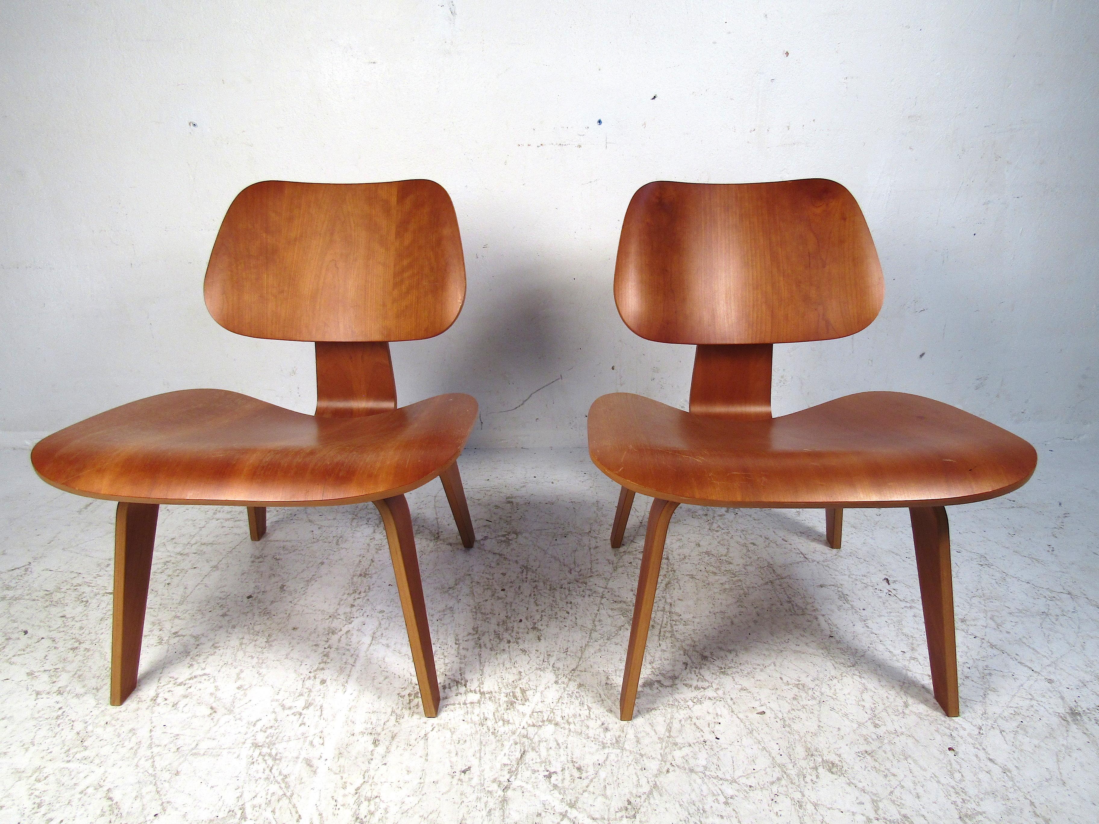 Nice pair of bentwood chairs. An Eames design. Please confirm item location with dealer (NJ or NY).