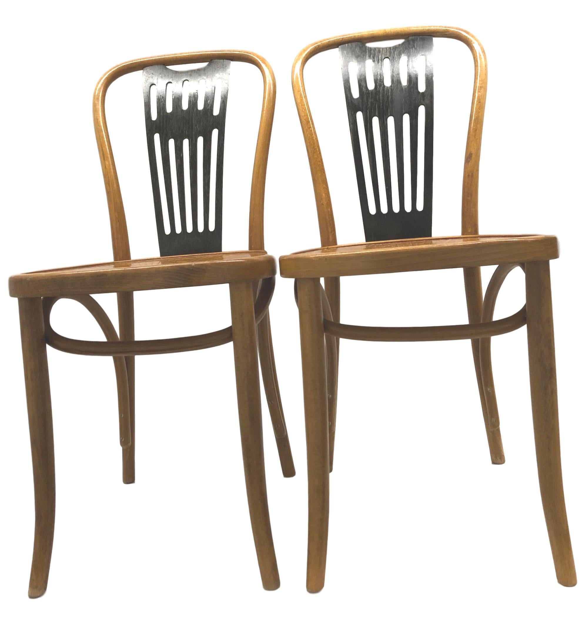 This bentwood chair, once used in traditional coffee houses, is from the manufacturer ZPM Radomsko from Poland, who has been producing wooden chairs for Thonet since 1881. These Chairs were made for Mobilair Germany. A corresponding label is located