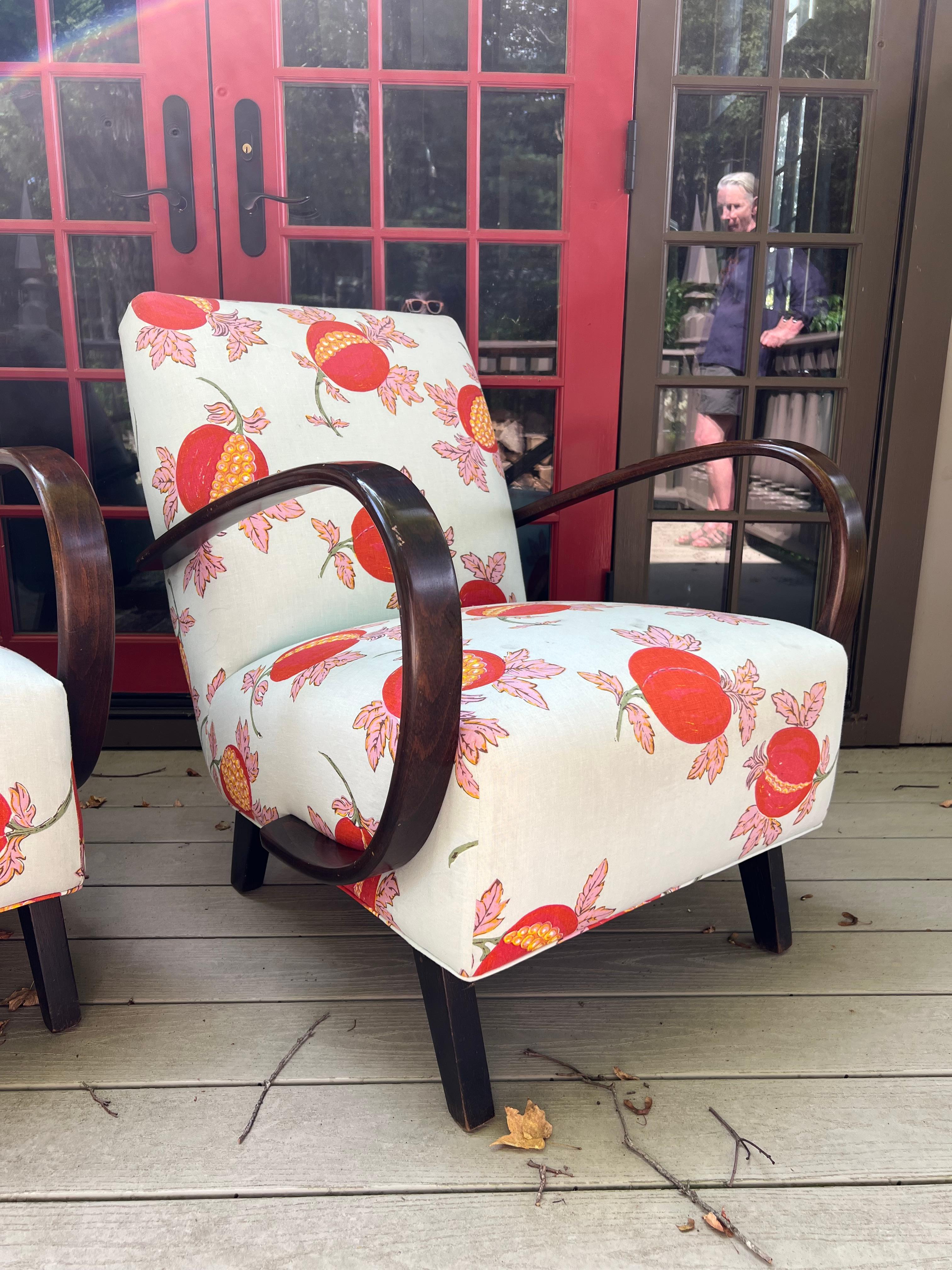 These sculptural bentwood lounge chairs are a nod to the iconic work of Czech designer Jindřich Halabala. Though unmarked, their graceful, continuous curves and curvilinear silhouette evoke his renowned H-269 chairs, blending early 20th-century