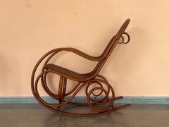 Pair of Bentwood Rocking Chairs with Cane Seat and Back