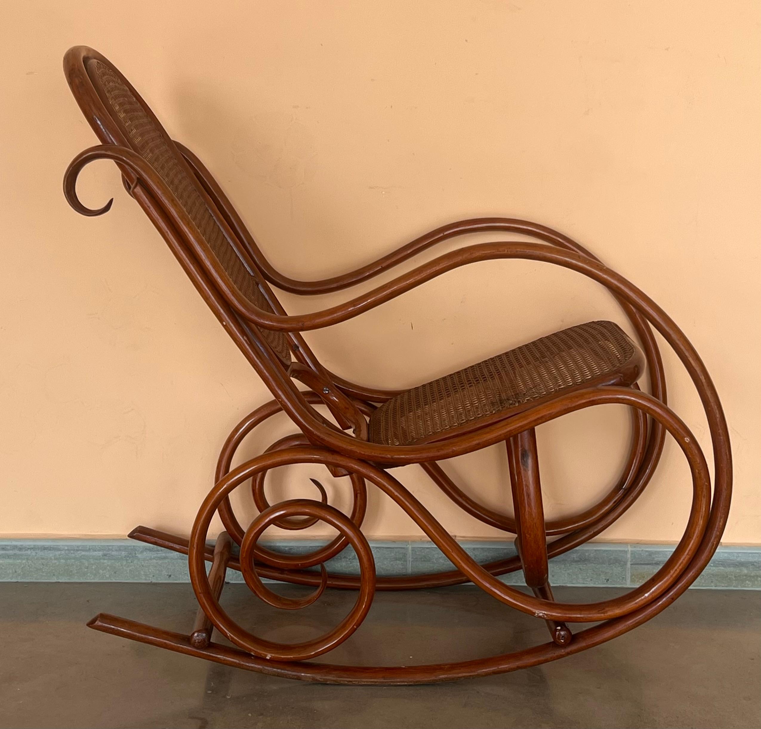 Pair of Bentwood Rocking Chairs with Cane Seat and Back In Good Condition For Sale In Miami, FL