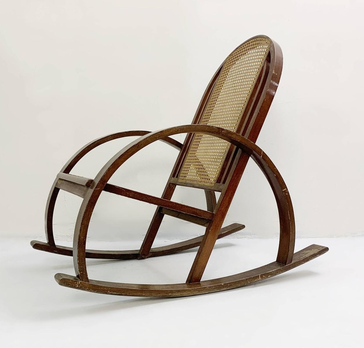 Pair of bentwood rocking chairs with sitting and back in caning.