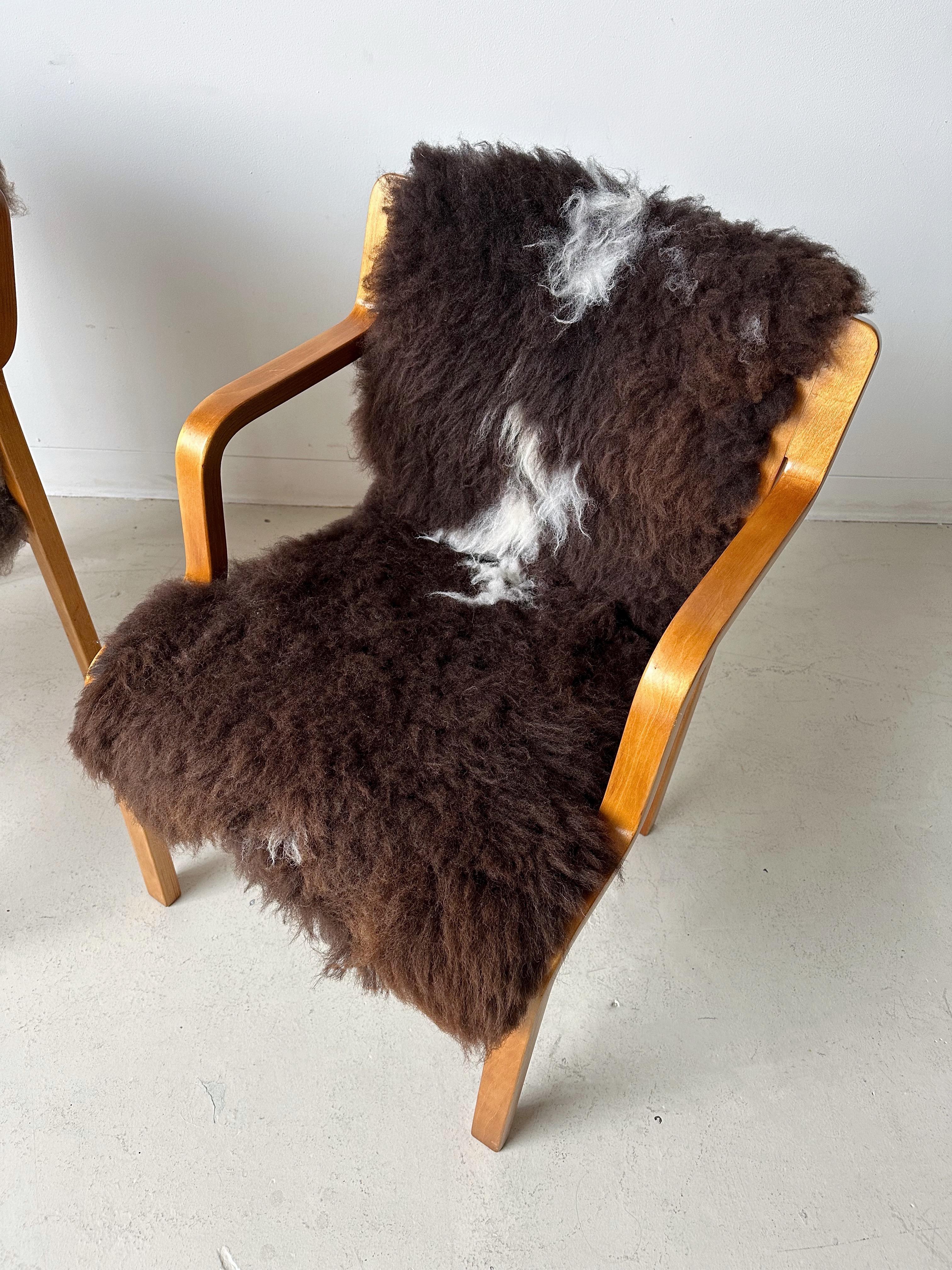 Mid-Century Modern Pair of Bentwood & Sheepskin Chairs by Asko Finland