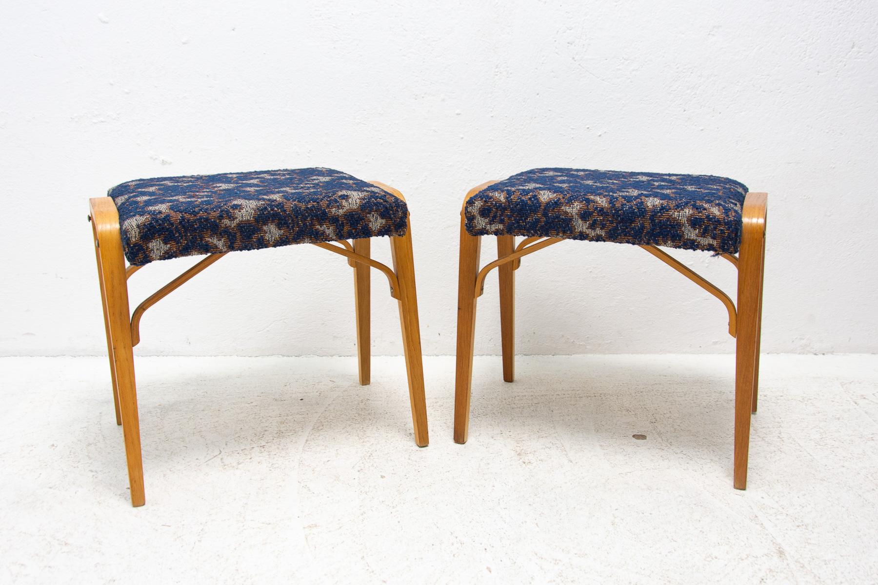 These stools were designed by Ludvík Volák for Drevopodnik Holešov. It was made in the former Czechoslovakia in the 1970´s. Features an upholstered seats and structure is made of bent plywood. In very good original condition, bears some signs of age