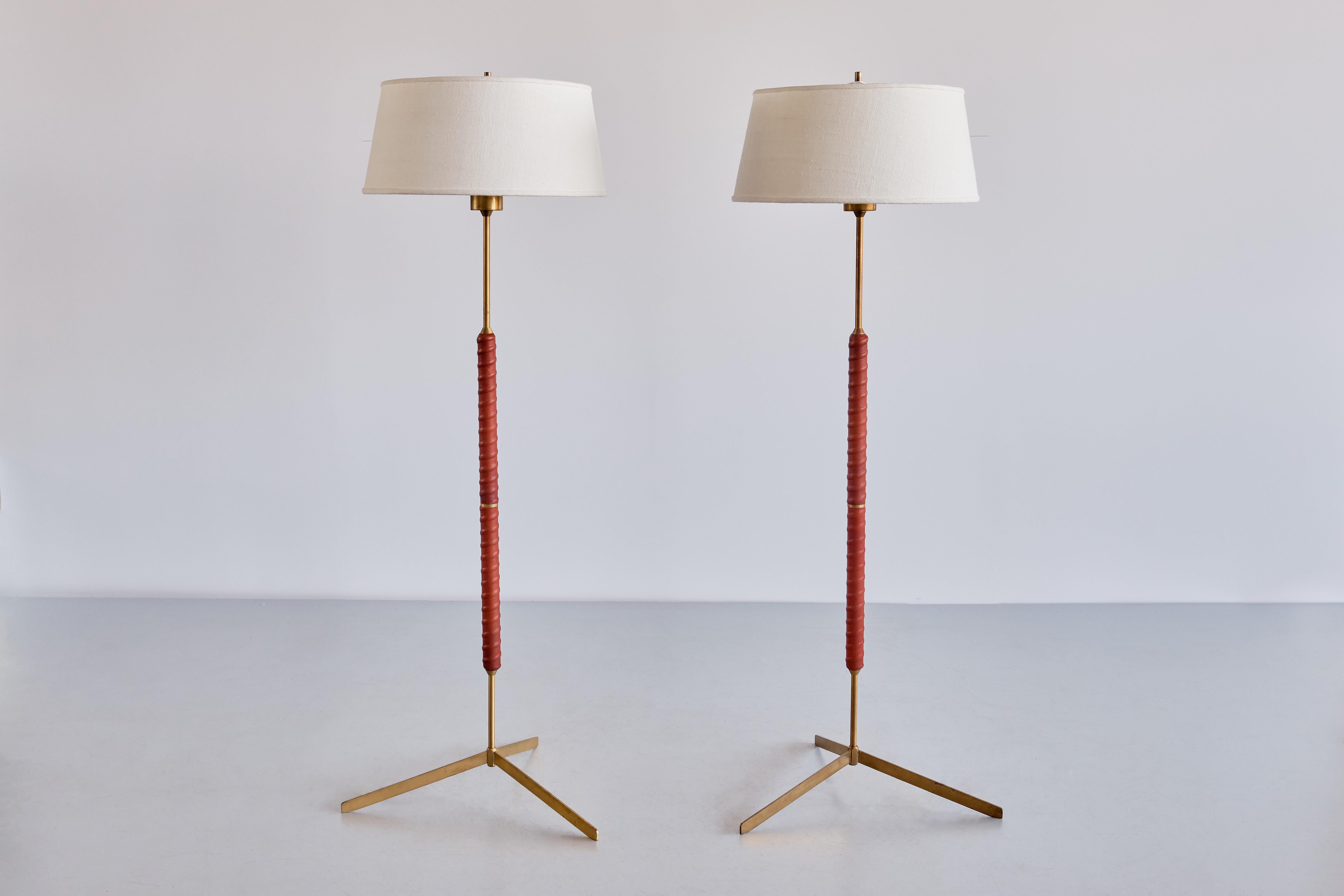 This elegant pair of floor lamp was produced by Bergboms in Sweden in the late 1940s. This particular design is model G-31 and is underneath marked on the base with this number.

The design is characterized by the striking three legged base