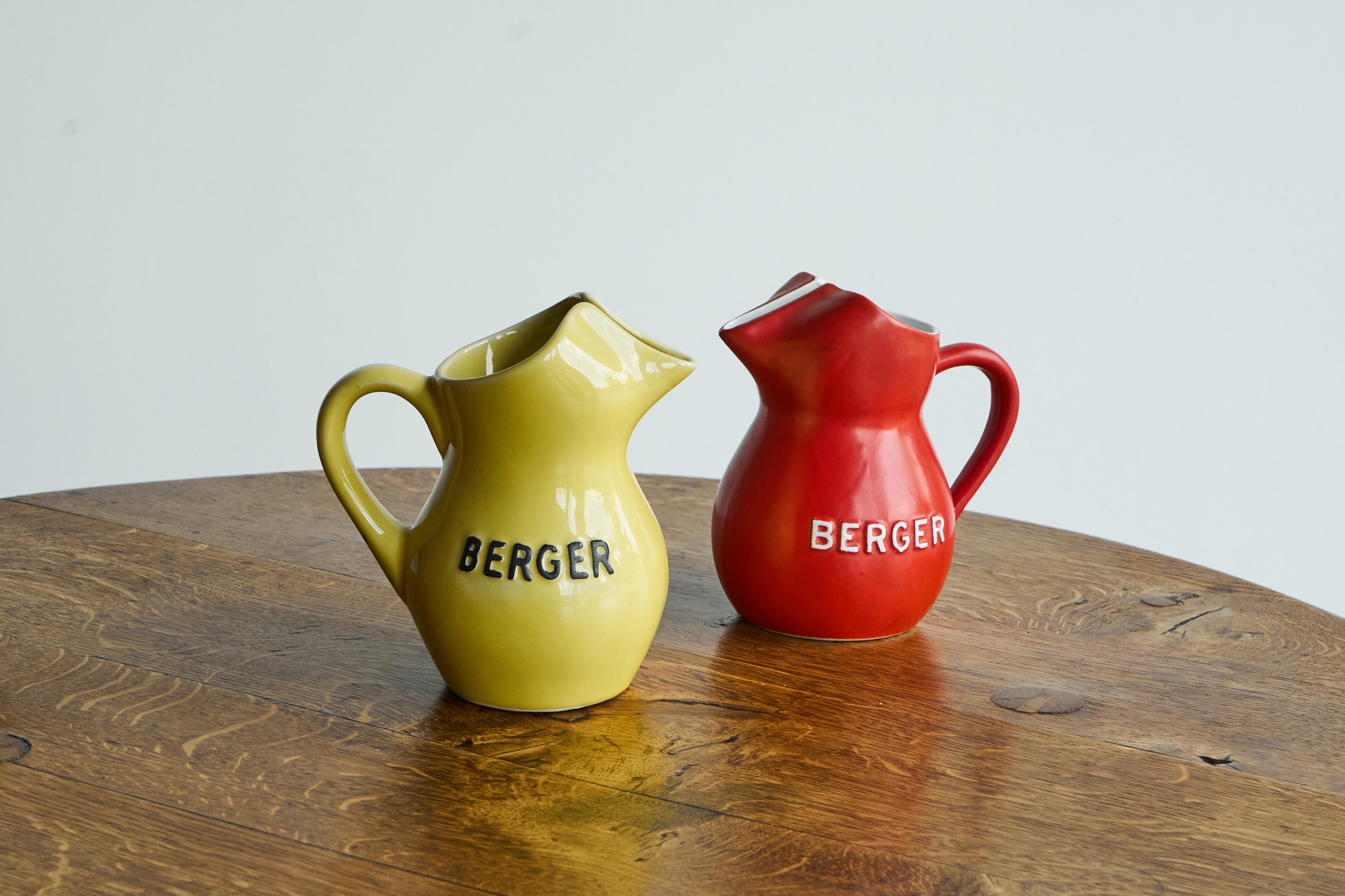 Pair of Berger 'Pastis de Marseille' Water Jugs, France, 1960s.

A lovely pair of yellow and red Berger Pastis (Pastis de Marseille, a typically French apéritif) water jugs in glazed pottery - originally for mixing the pastis with water. Works great