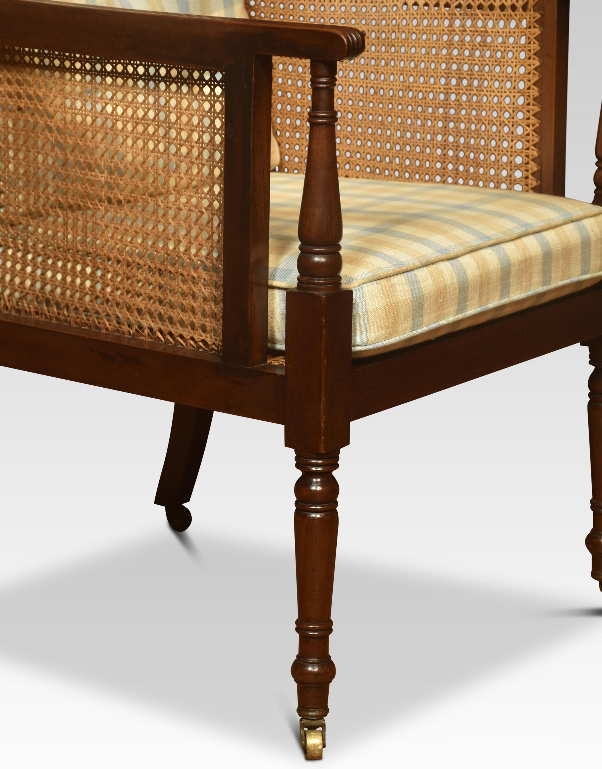 Pair of 19th century Bergere armchair, the solid frame and inset bergere back and arms, above removable cushions. Raised up on turned reeded tapering front legs.
Dimensions
Height 37.5 inches height to seat 17.5 Inches
Width 21 inches
Depth 26.5