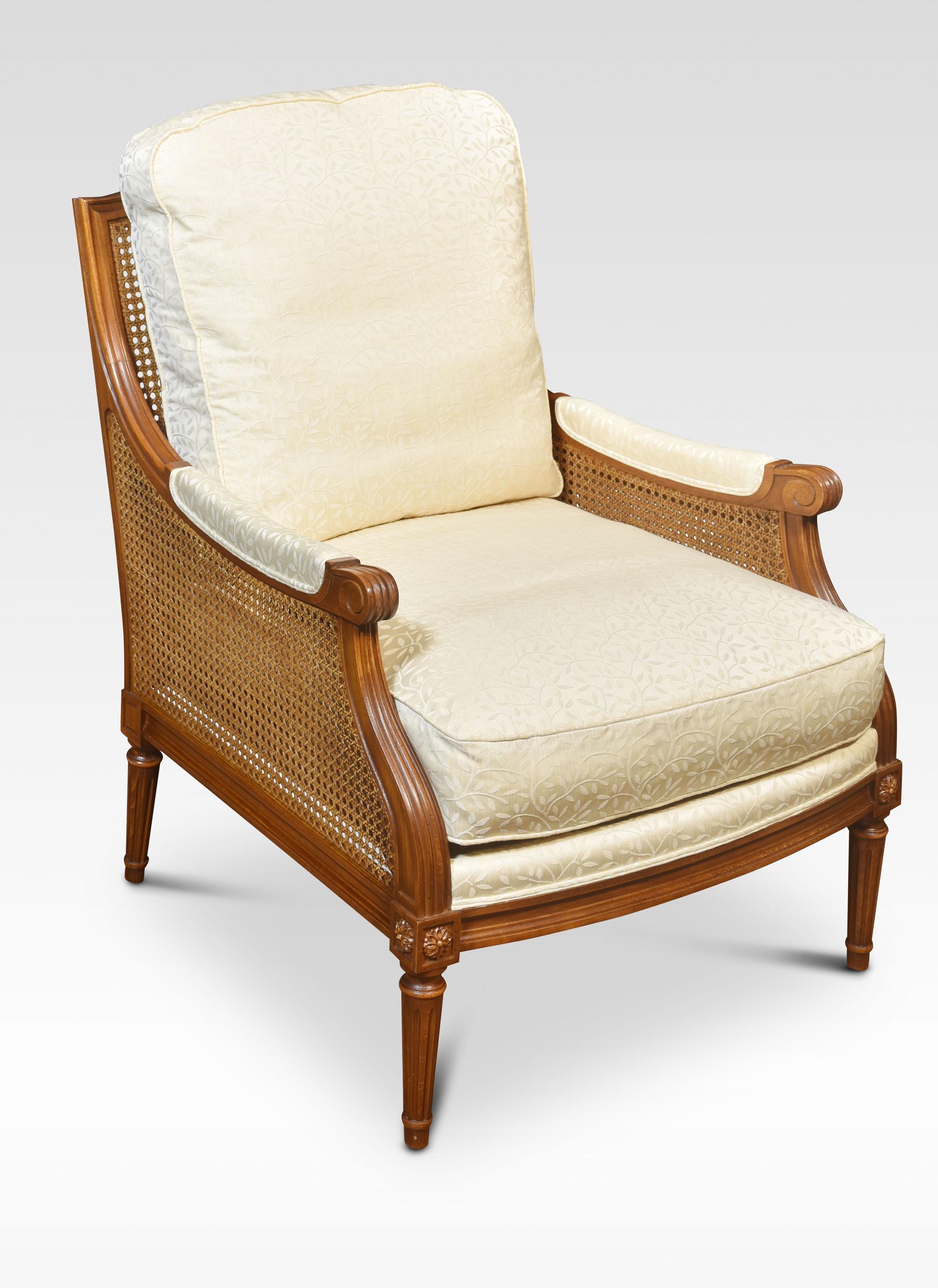 Bergere Armchair, the shaped carved molded backs, and inset bergere pannels, to the removable back and seat cushion. Raised up on turned reeded tapering legs.
Dimensions
Height 37 Inches height to seat 19 Inches
Width 27.5 Inches
Depth 33 Inches.