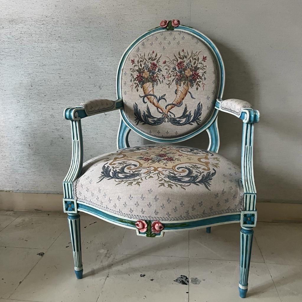 A pair of Bergere with ottoman recovered  with tapisserie fabric wood painted