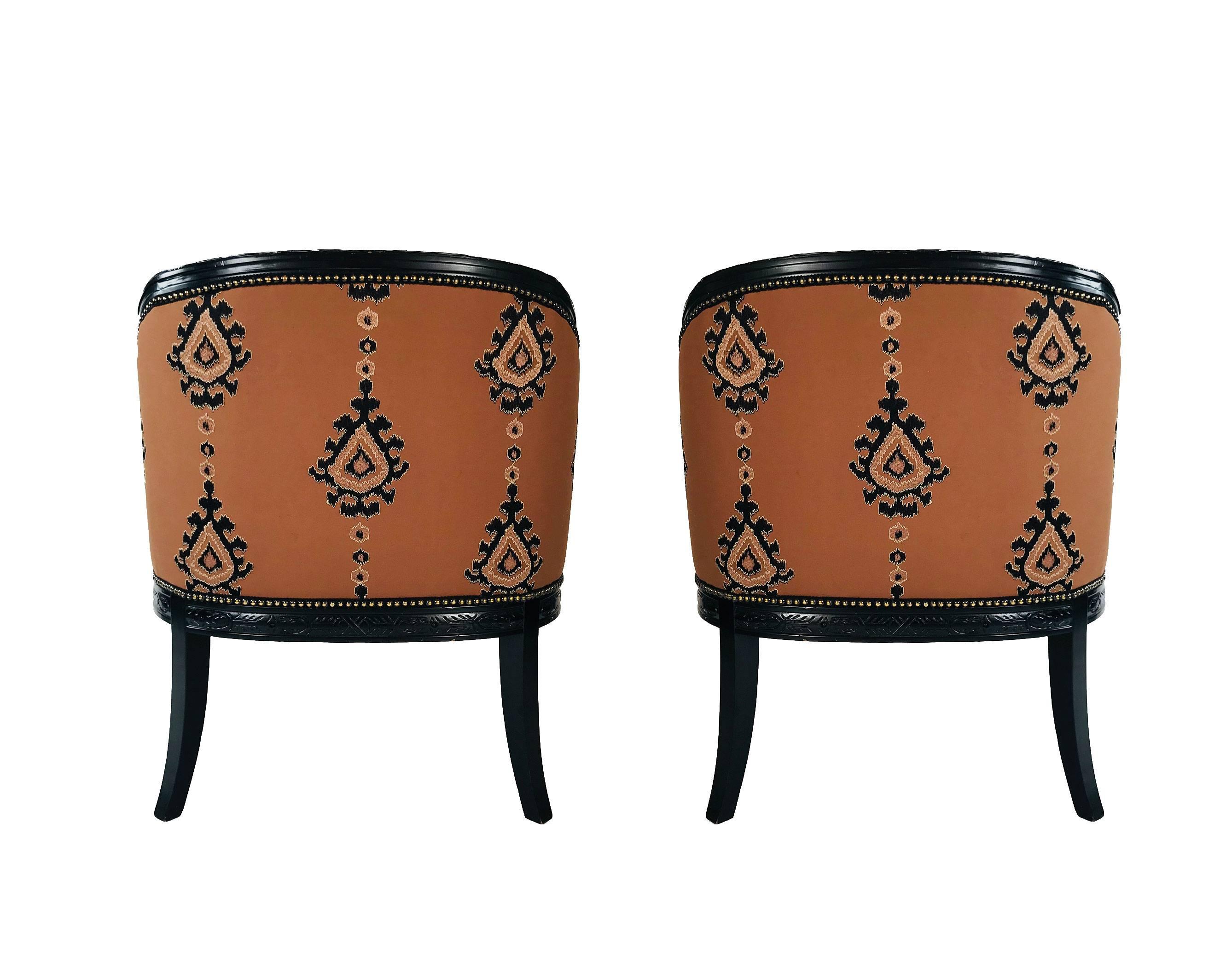 American Pair of Bergere chairs with carved ram head arms