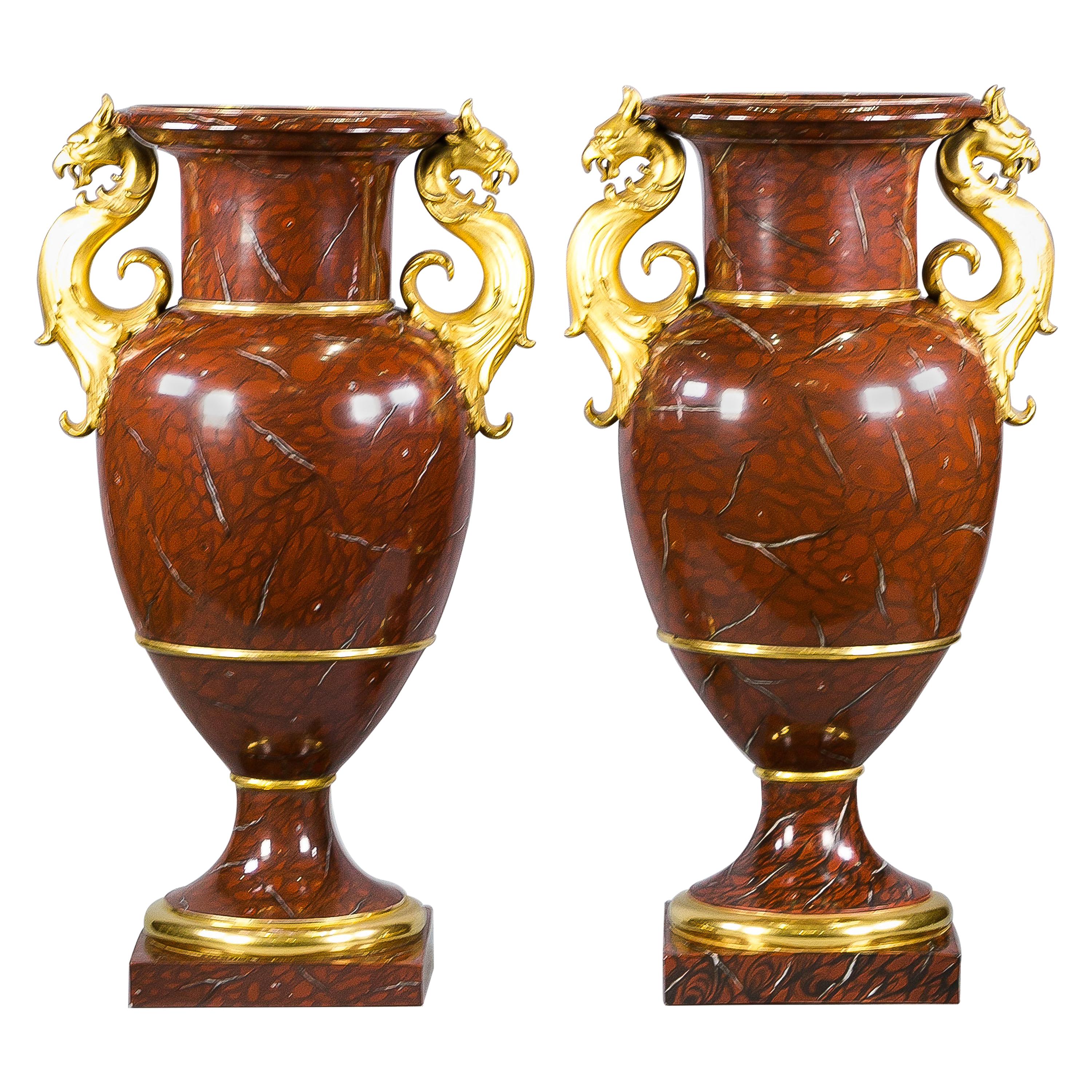 Pair of Berlin Porcelain Faux Marble and Gilt Urns, circa 1825 For Sale