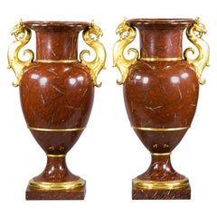 Pair of Berlin Porcelain Faux Marble and Gilt Urns, circa 1825