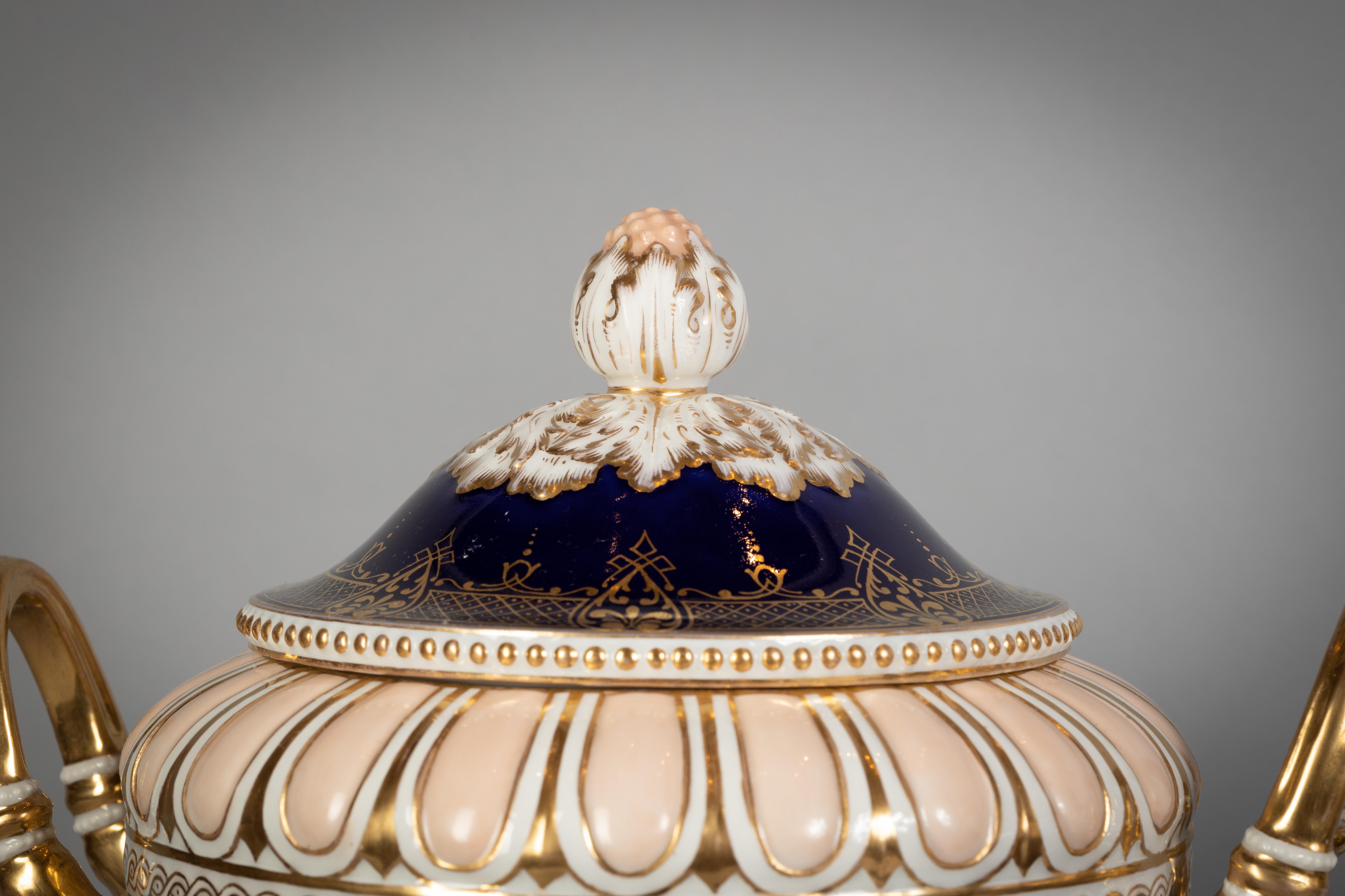 German Pair of Berlin Porcelain Two-Handled Covered Urns, circa 1870 For Sale