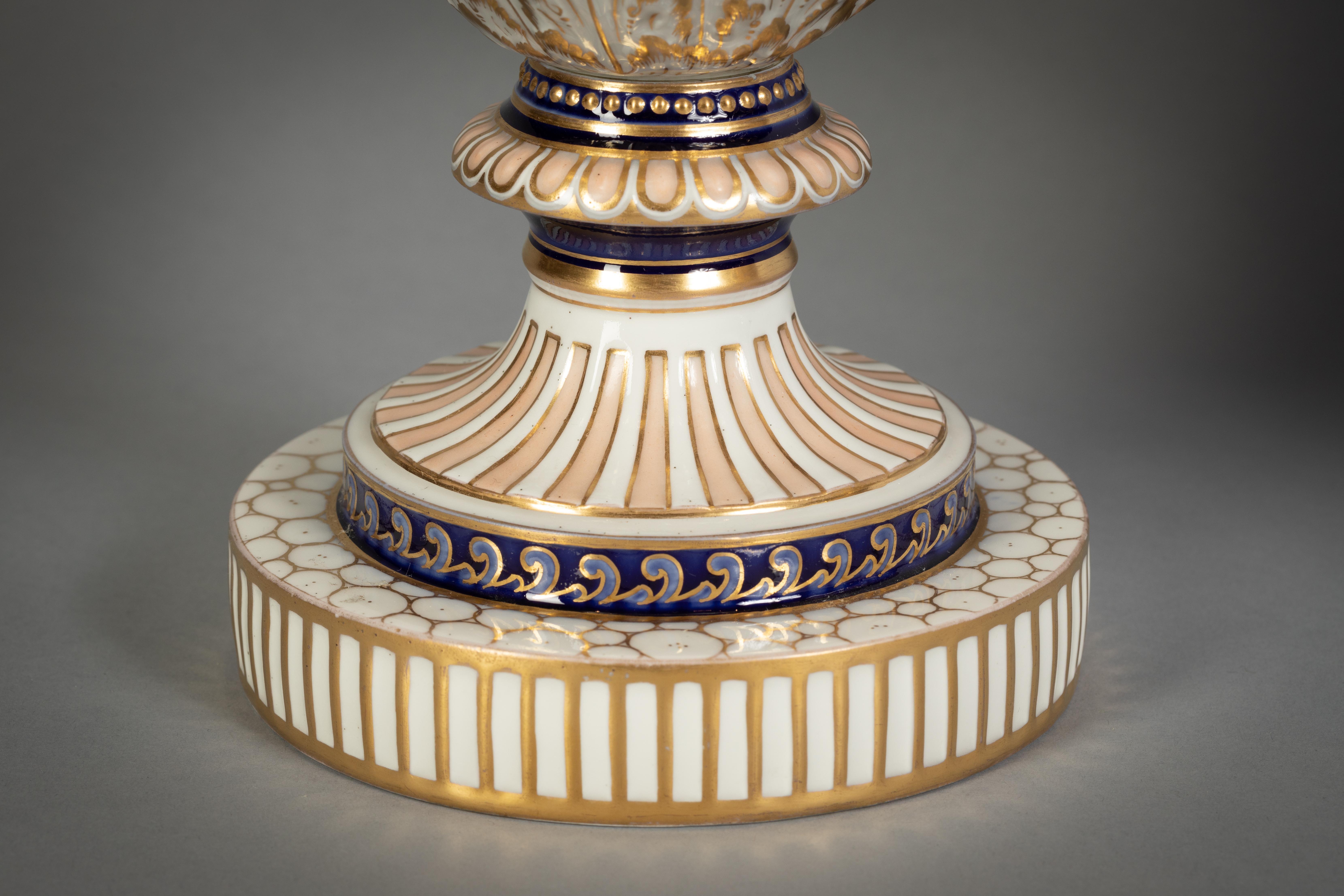 Pair of Berlin Porcelain Two-Handled Covered Urns, circa 1870 In Good Condition For Sale In New York, NY