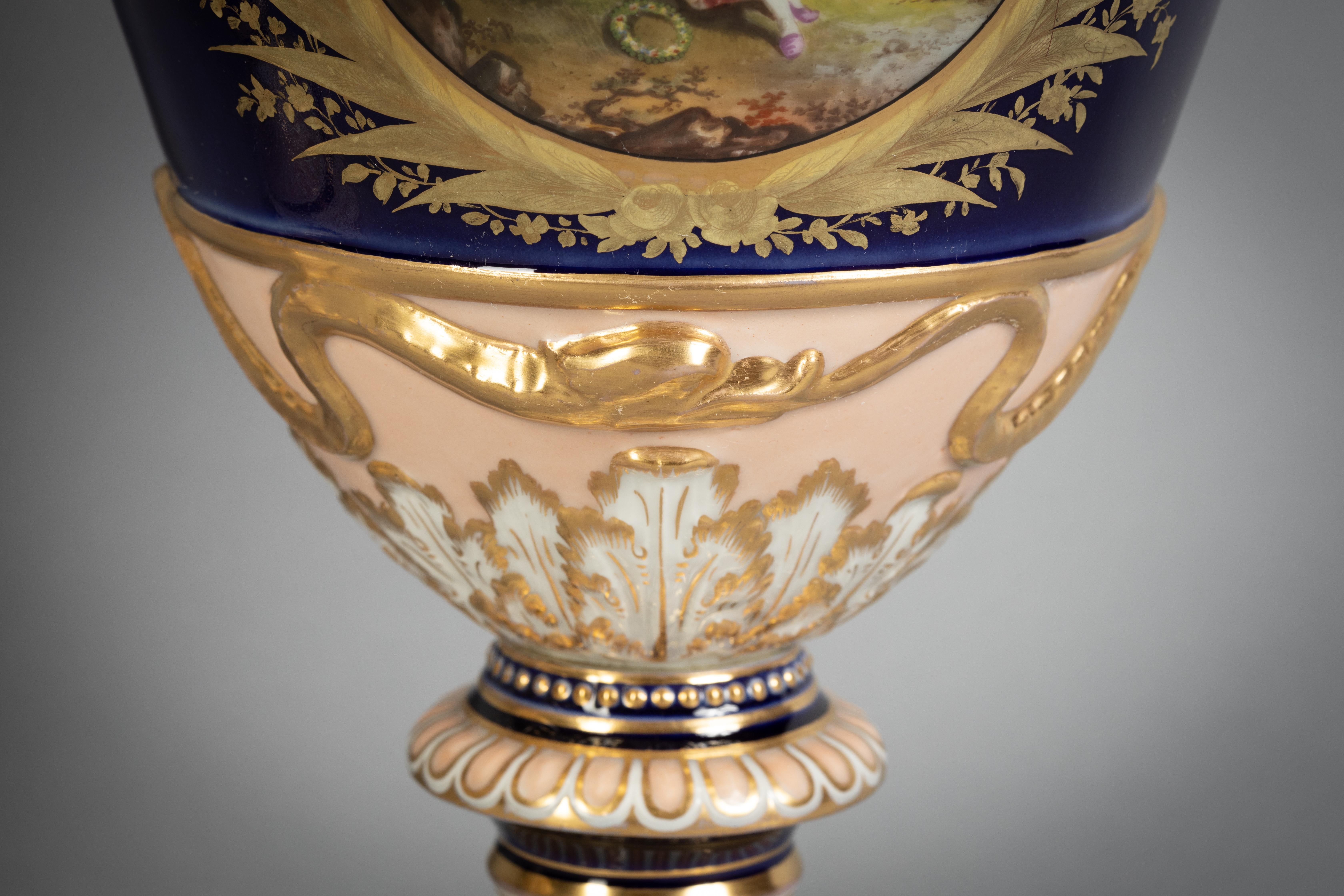 Pair of Berlin Porcelain Two-Handled Covered Urns, circa 1870 In Good Condition For Sale In New York, NY