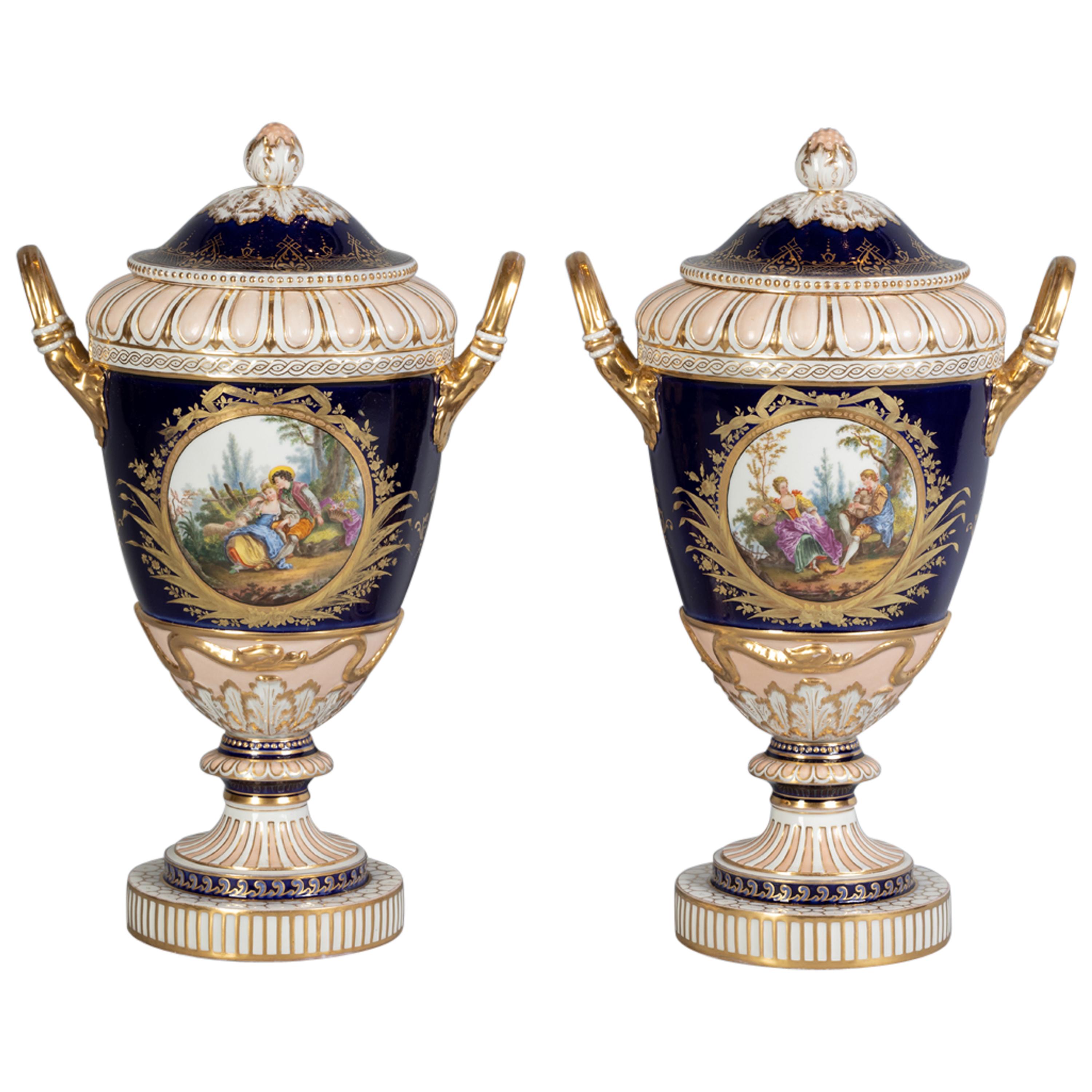 Pair of Berlin Porcelain Two-Handled Covered Urns, circa 1870 For Sale
