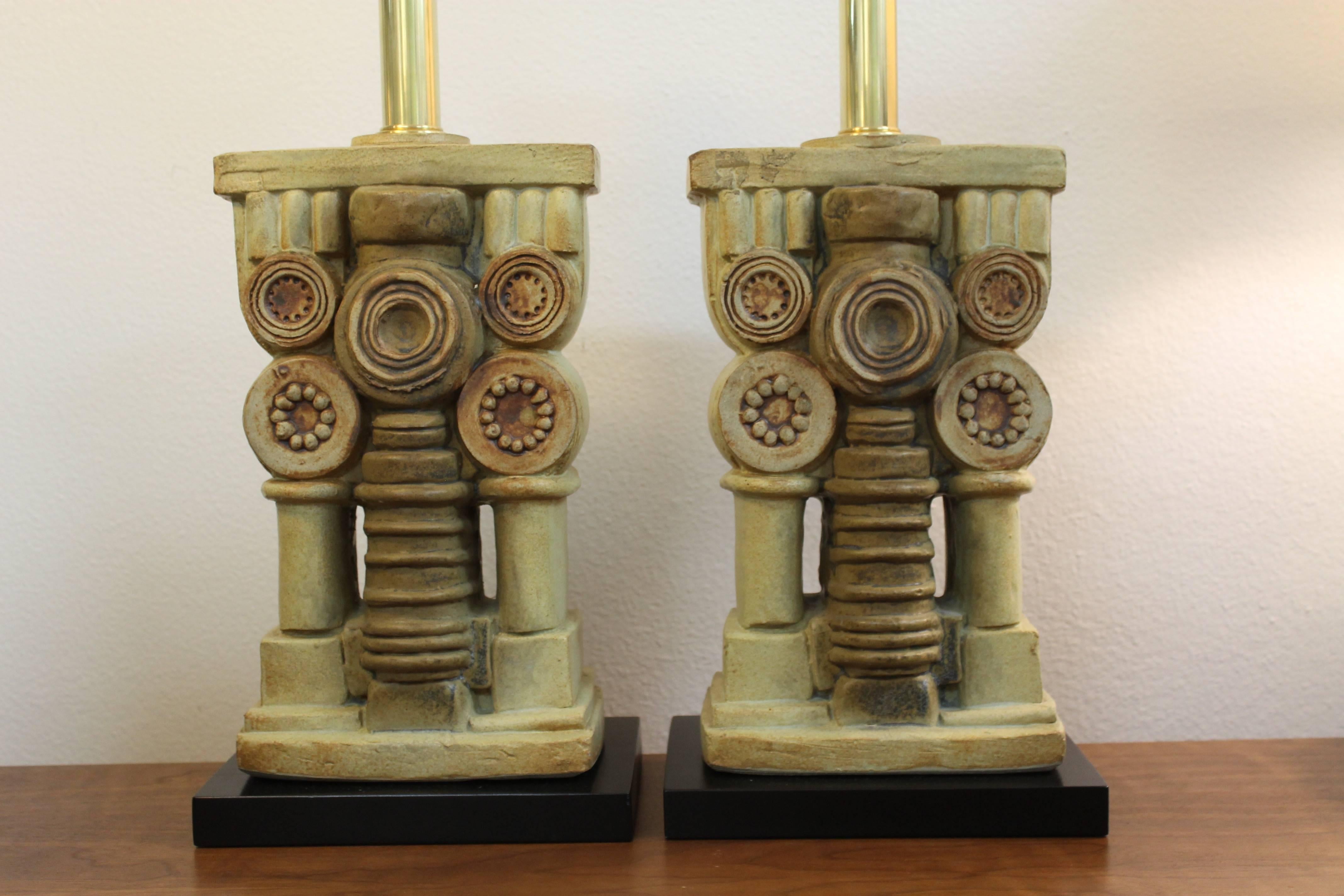 Pair of ceramic lamps by Bernard Rooke. Lamps have been professionally rewired with new black wood bases. Measures: Ceramic portion is 13