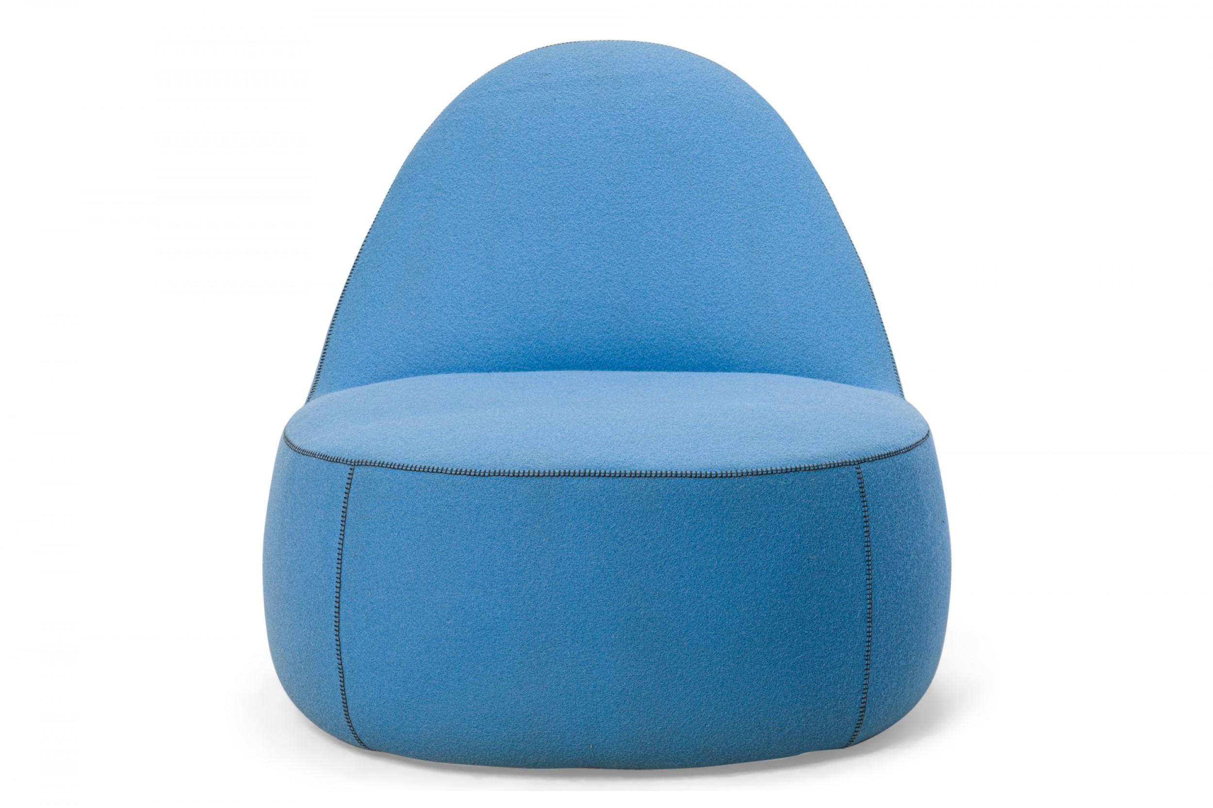 PAIR of American Contemporary slipper / side chairs with light blue felt upholstery with dark blue contrast blanket stitching around the seams, wide seats, and tapered backs, with a leather handle down each back, resting on concealed casters.